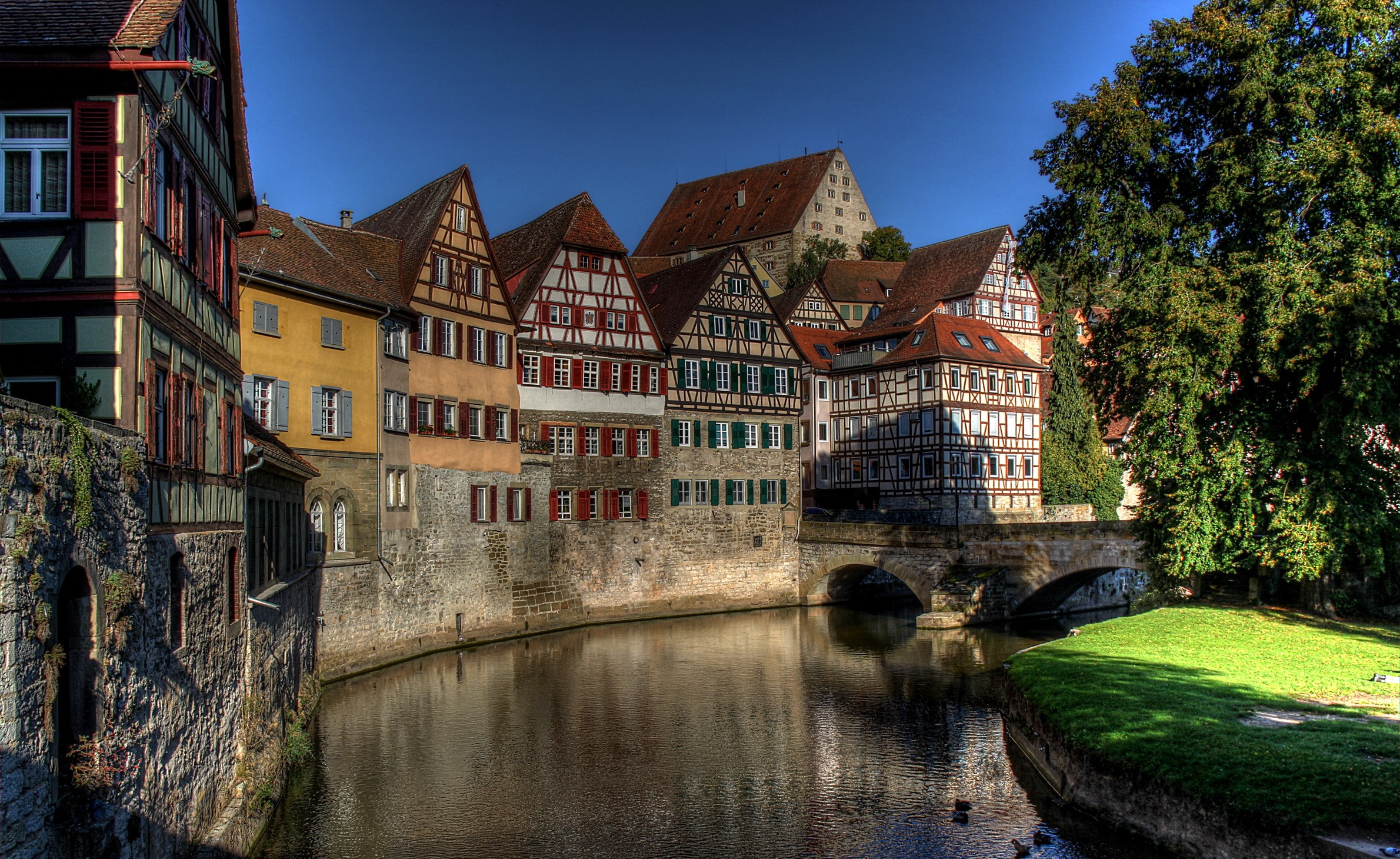 Half-timbered houses along a canal in Germany HD Wallpaper