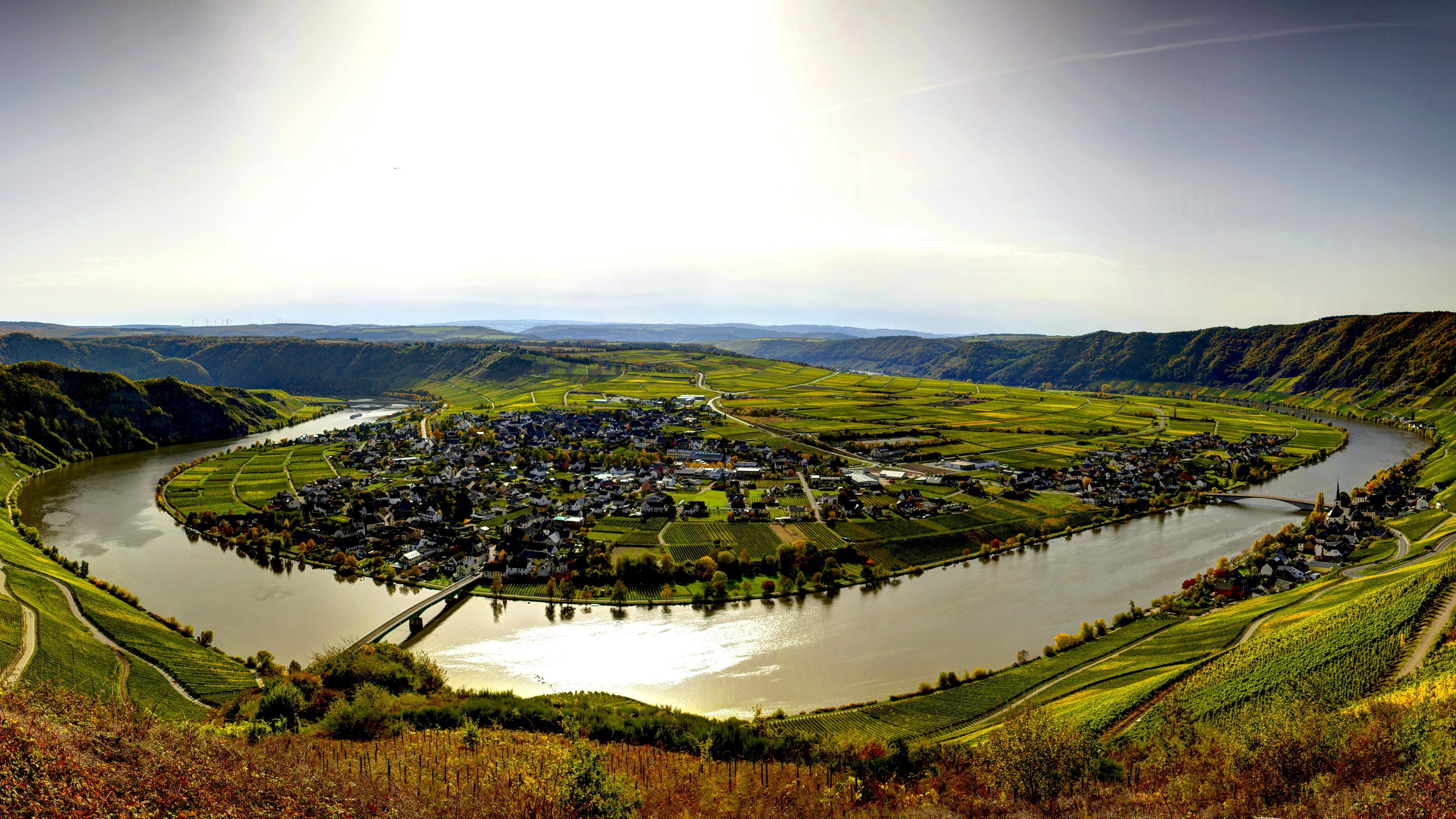 Moselle River loop with vineyards and village, Germany HD Wallpaper