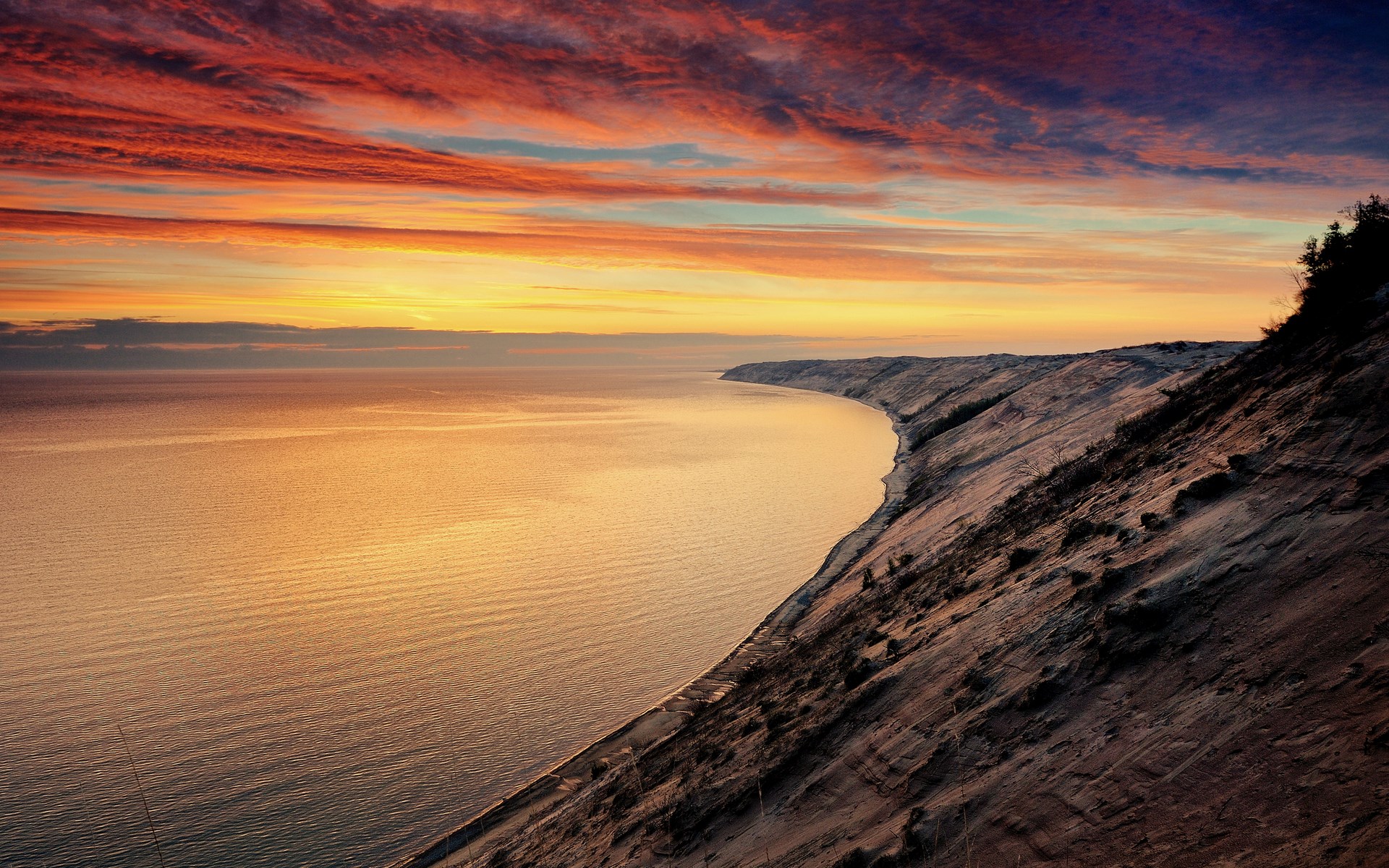 Sunset over a lake with sand dunes HD Wallpaper
