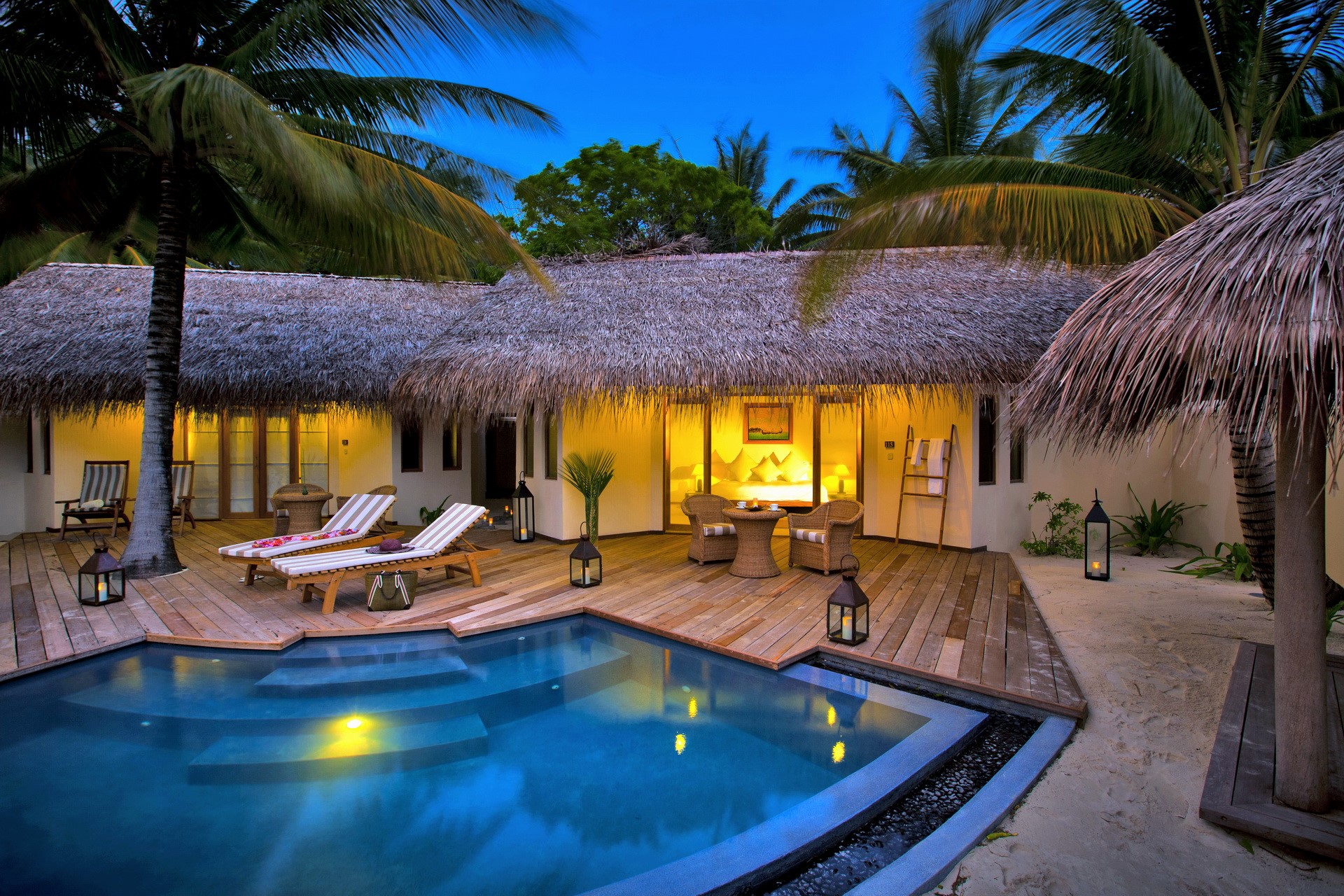 Maldives resort bungalow with private pool and lounge chairs HD Wallpaper