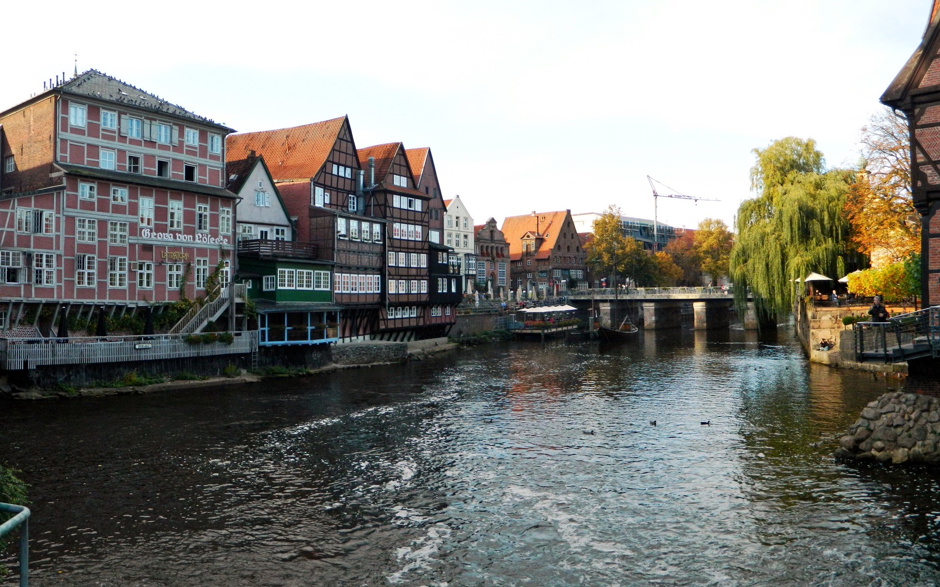 Riverfront buildings and bridge in Germany HD Wallpaper