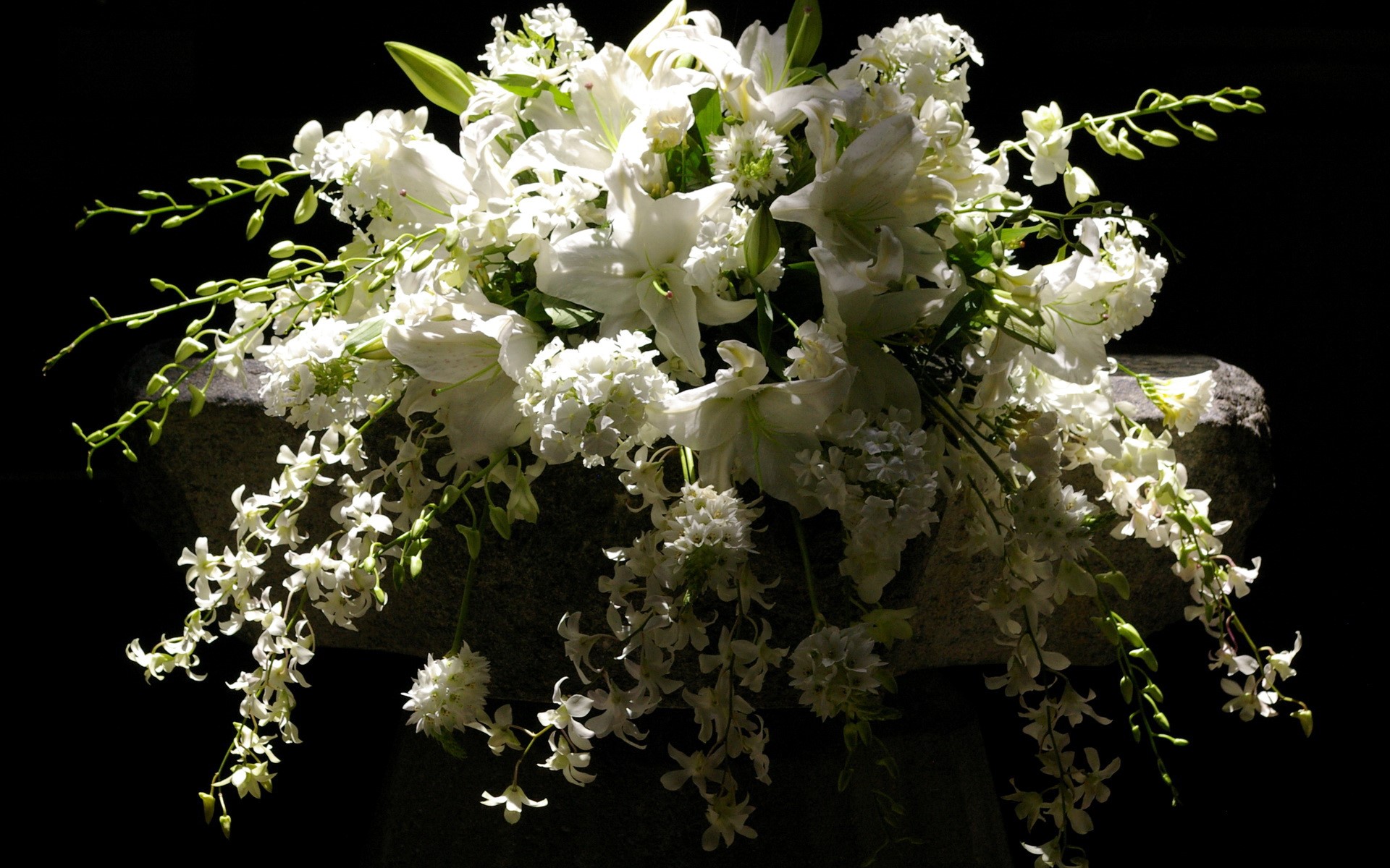 White flower bouquet on a stone pedestal HD Wallpaper