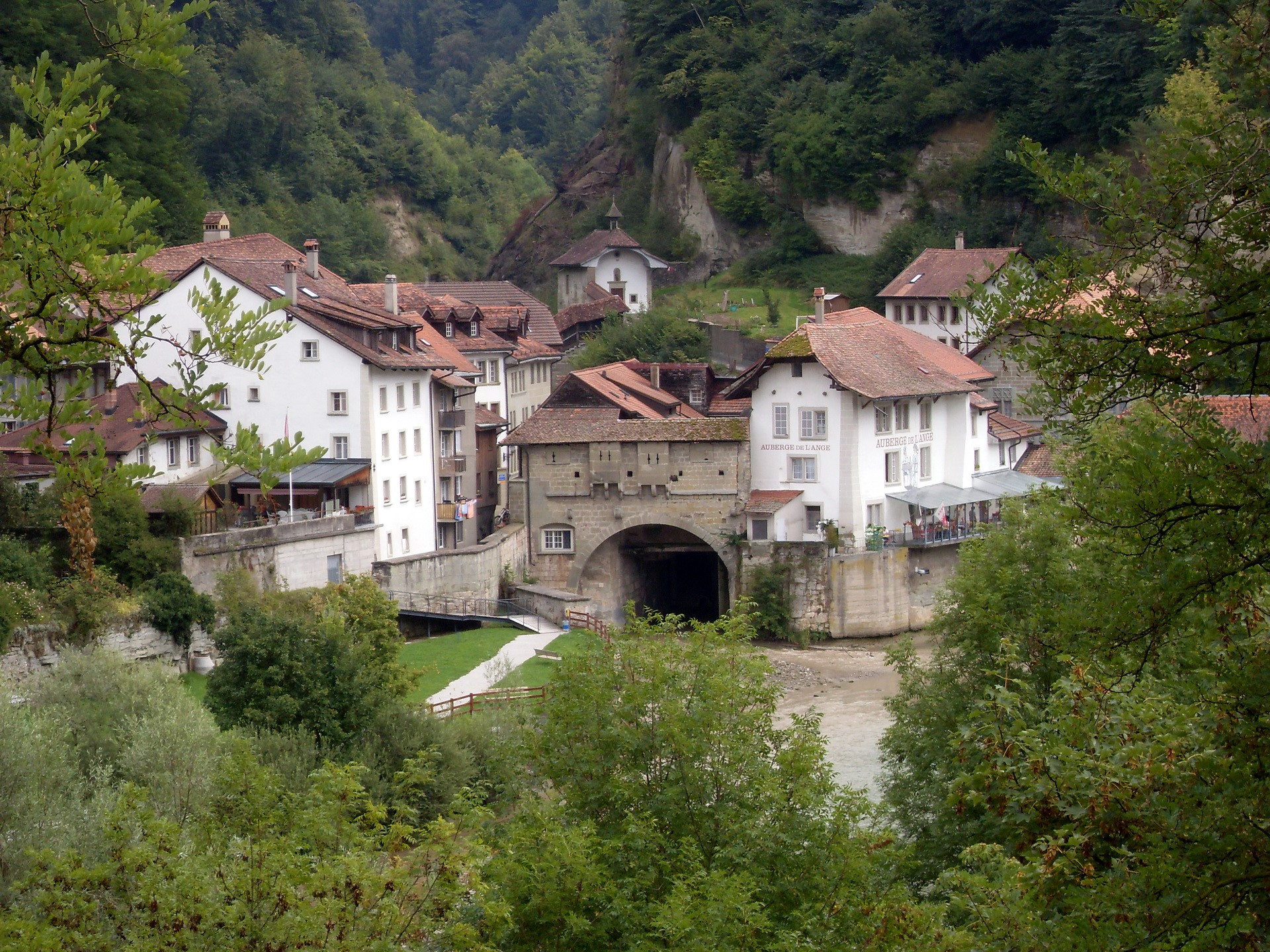 Town with bridge over river in Fribourg, Switzerland HD Wallpaper
