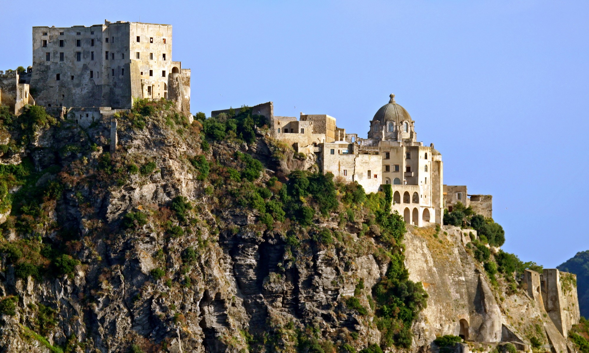 Castello Aragonese on a rocky cliff HD Wallpaper