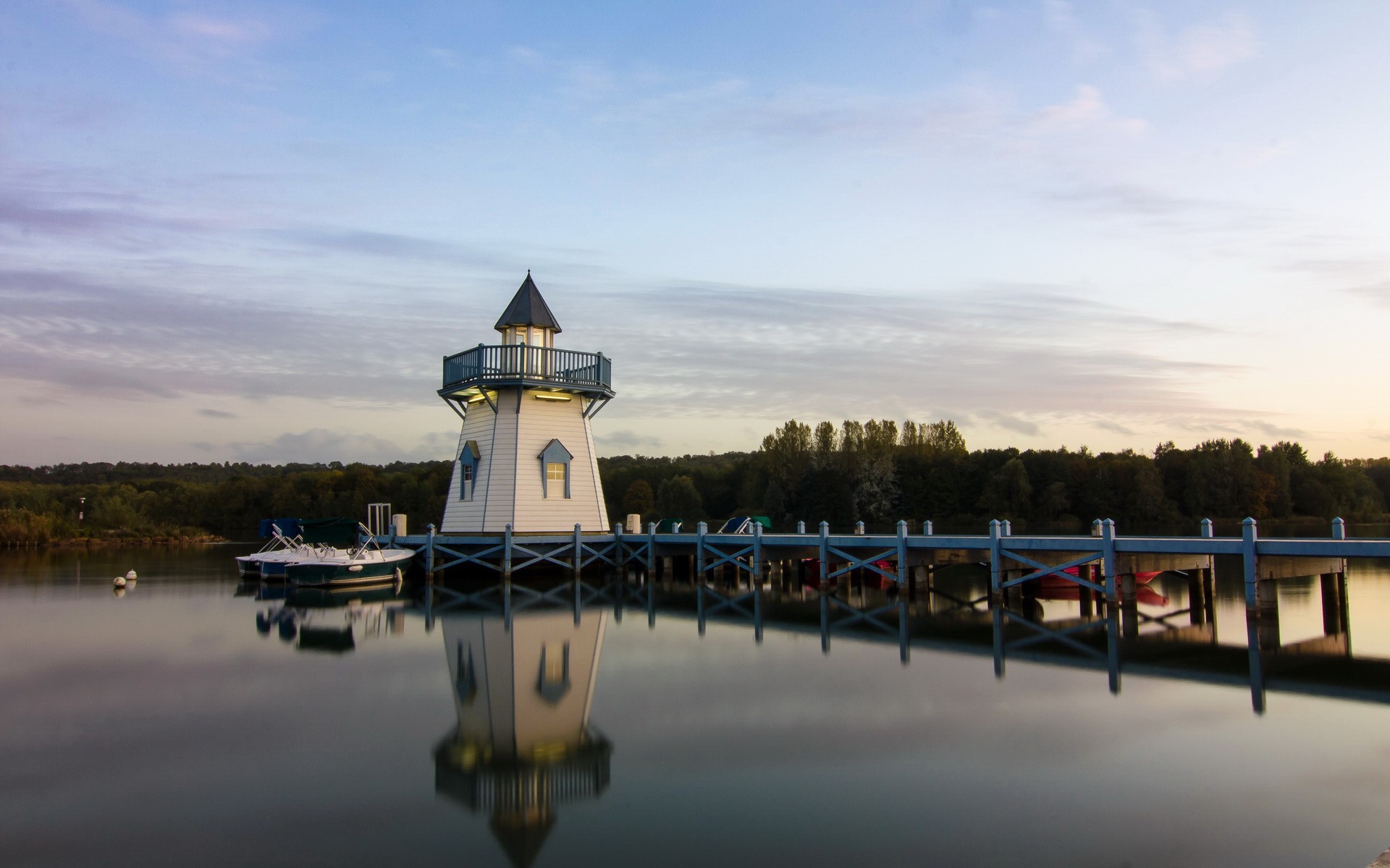 Lighthouse on a pier at sunrise HD Wallpaper