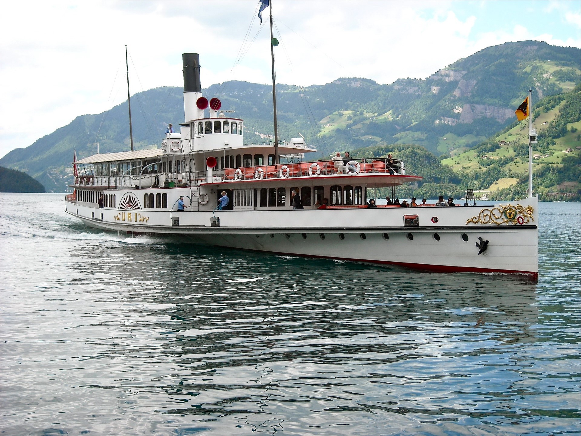 Steamboat URI on a lake with mountains HD Wallpaper