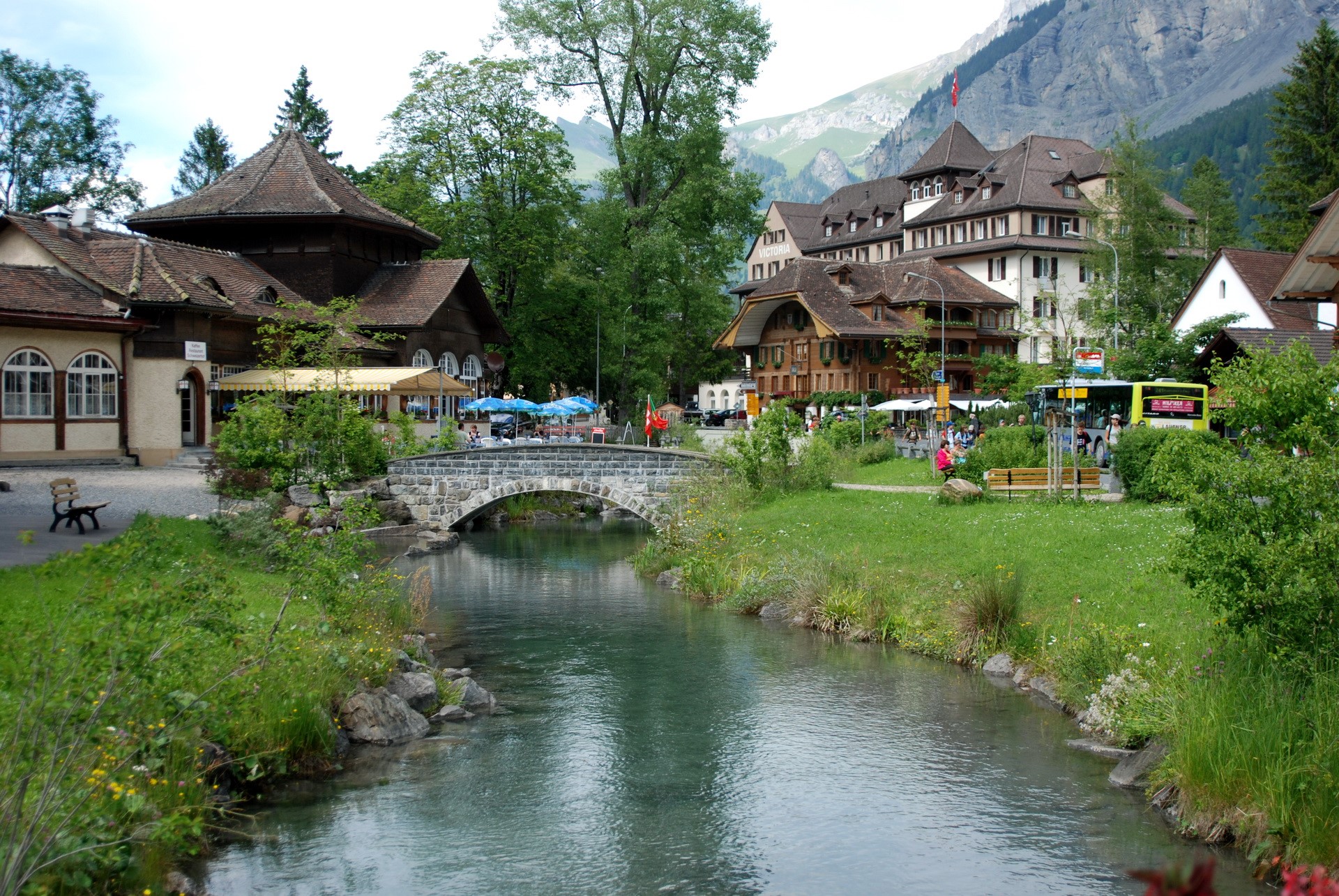 Village with river and mountains in Switzerland HD Wallpaper