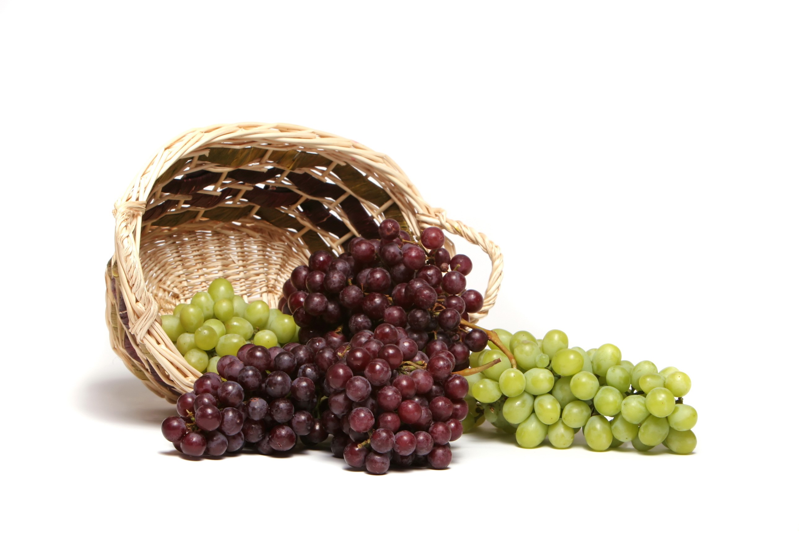 Grapes spilling from a basket HD Wallpaper