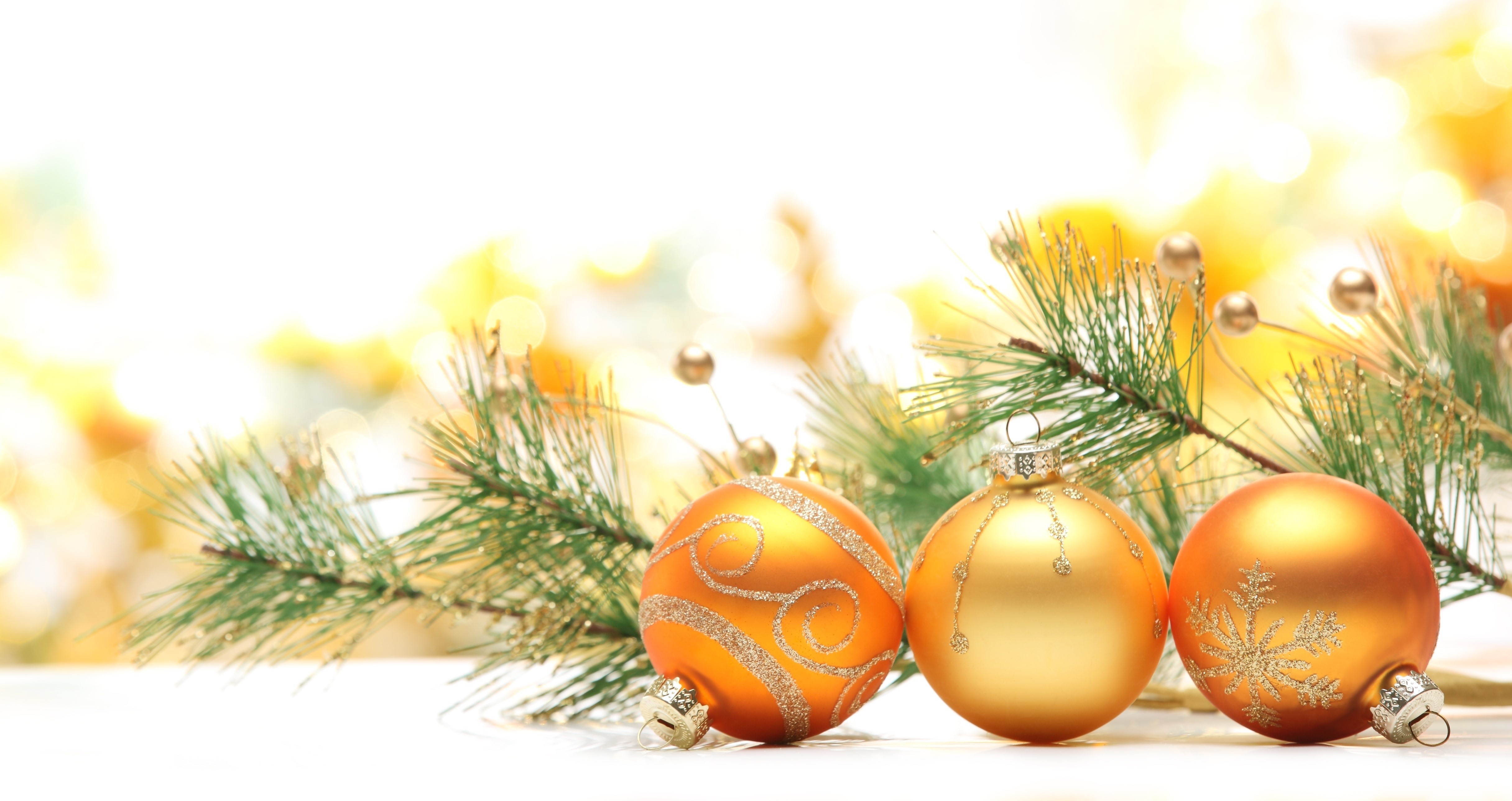 Christmas ornaments and pine branches with bokeh background HD Wallpaper