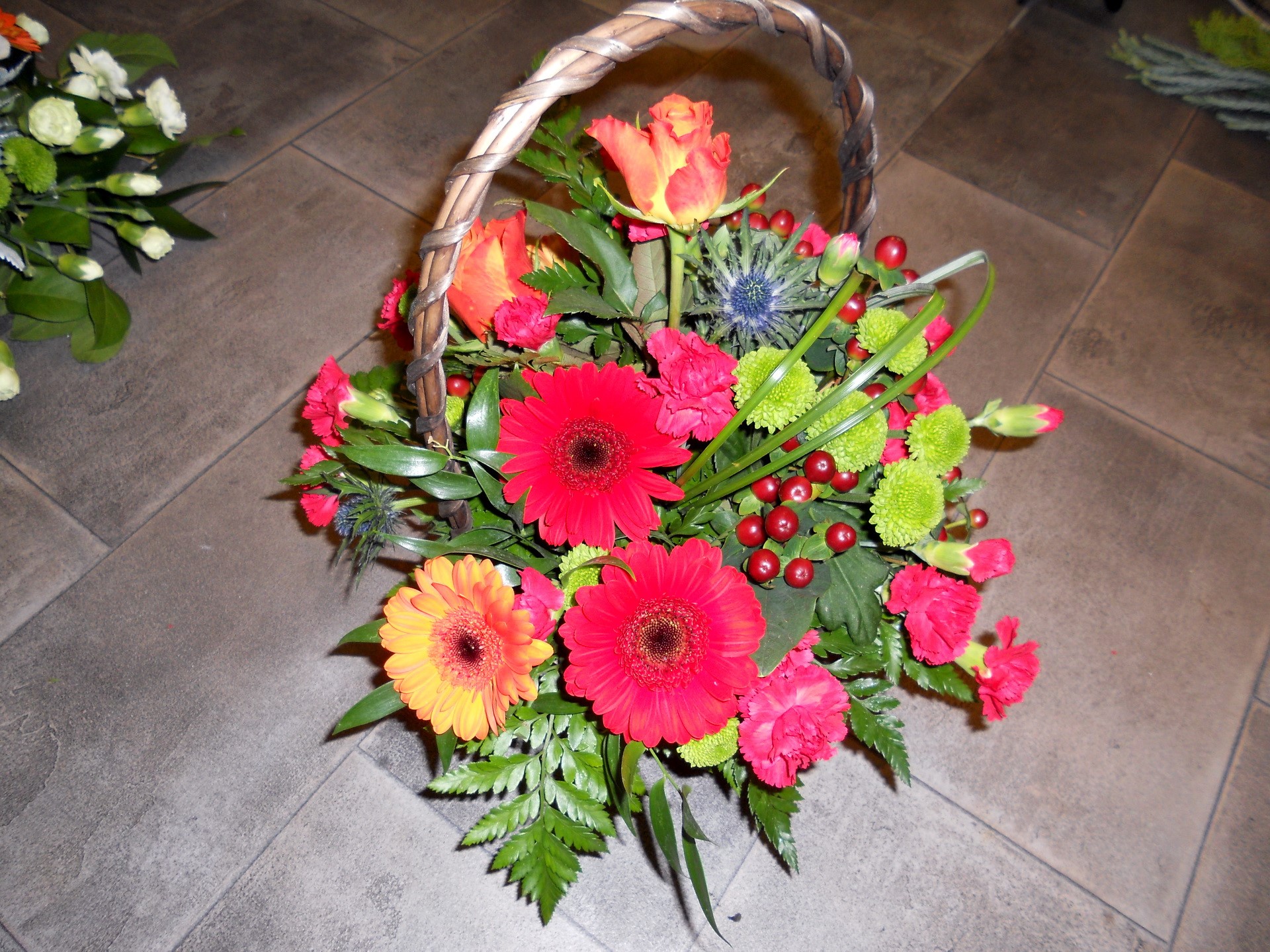 Flower basket arrangement with gerbera daisies and roses HD Wallpaper