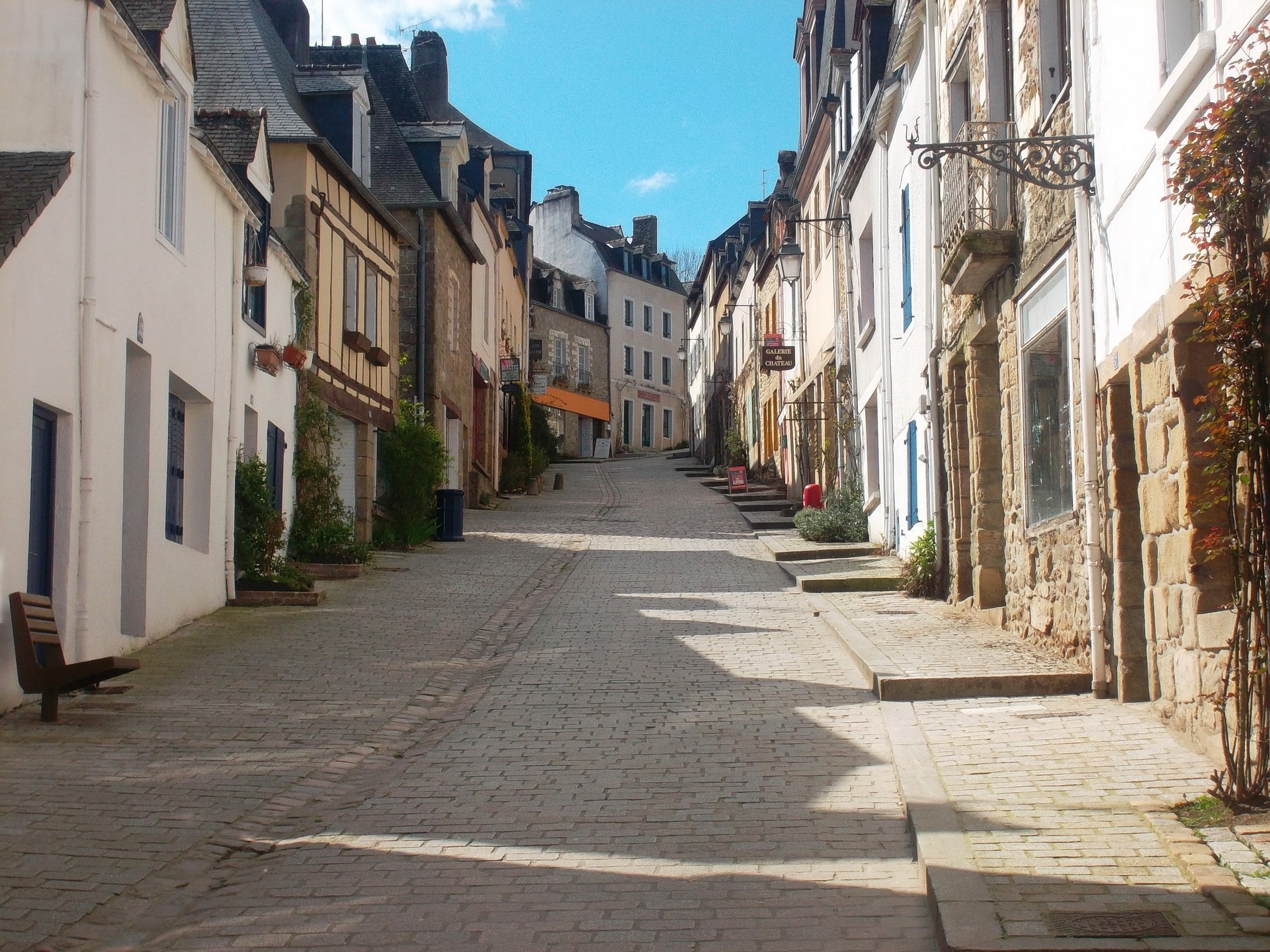Cobblestone street in a French town HD Wallpaper