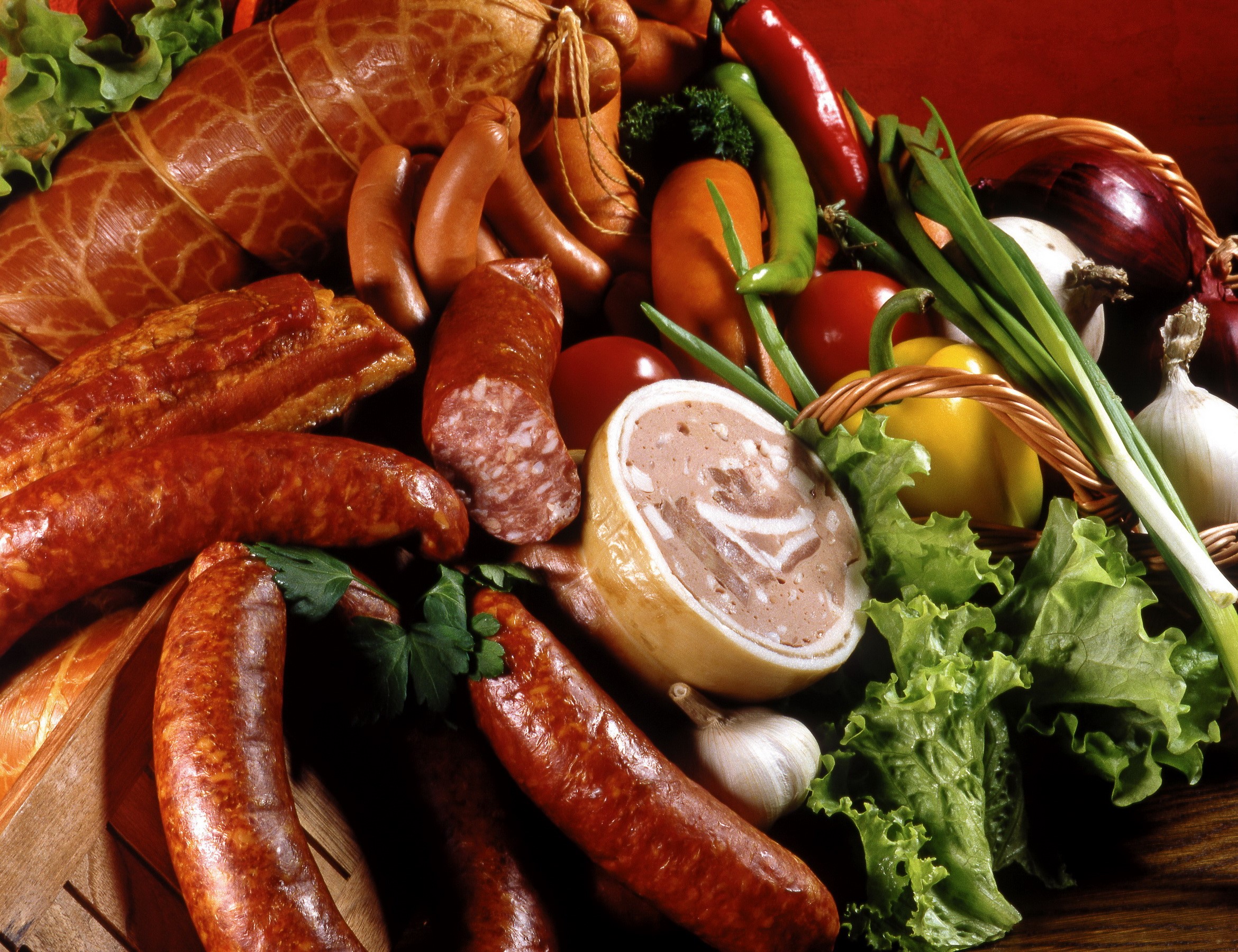 Assortment of sausages and fresh vegetables HD Wallpaper