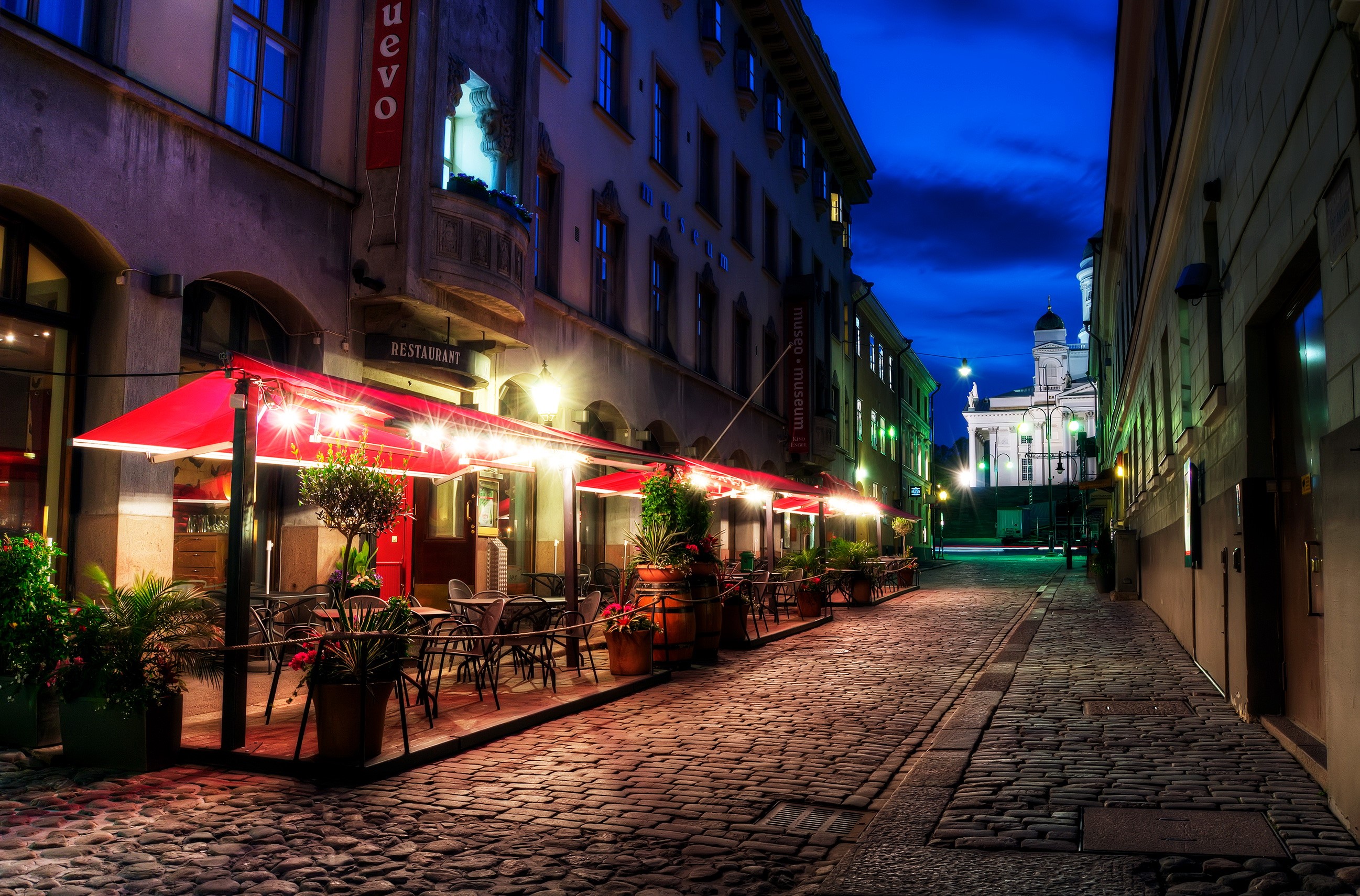 Street cafe and cathedral at night in Helsinki, Finland HD Wallpaper