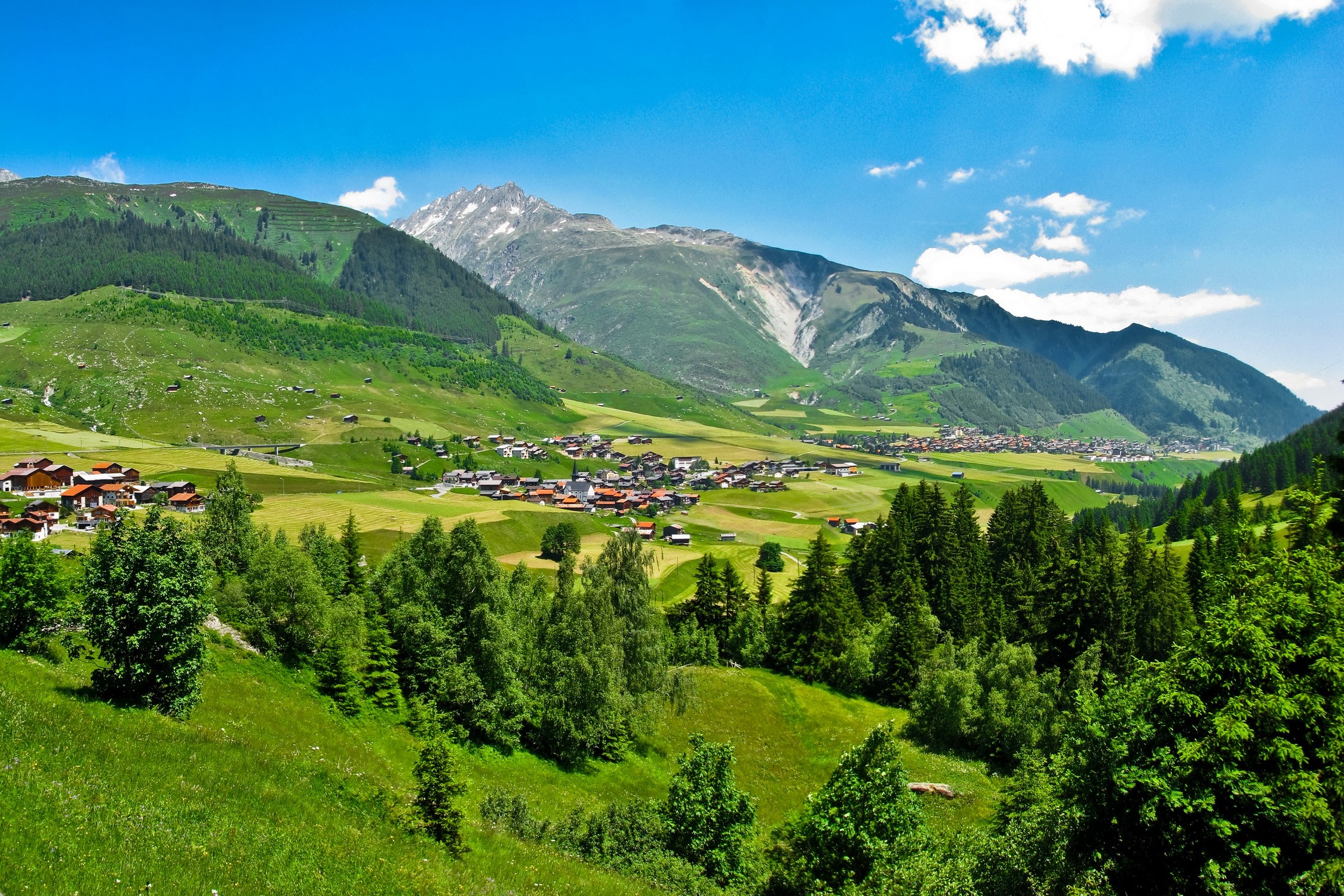 Alpine village in the Swiss Alps HD Wallpaper