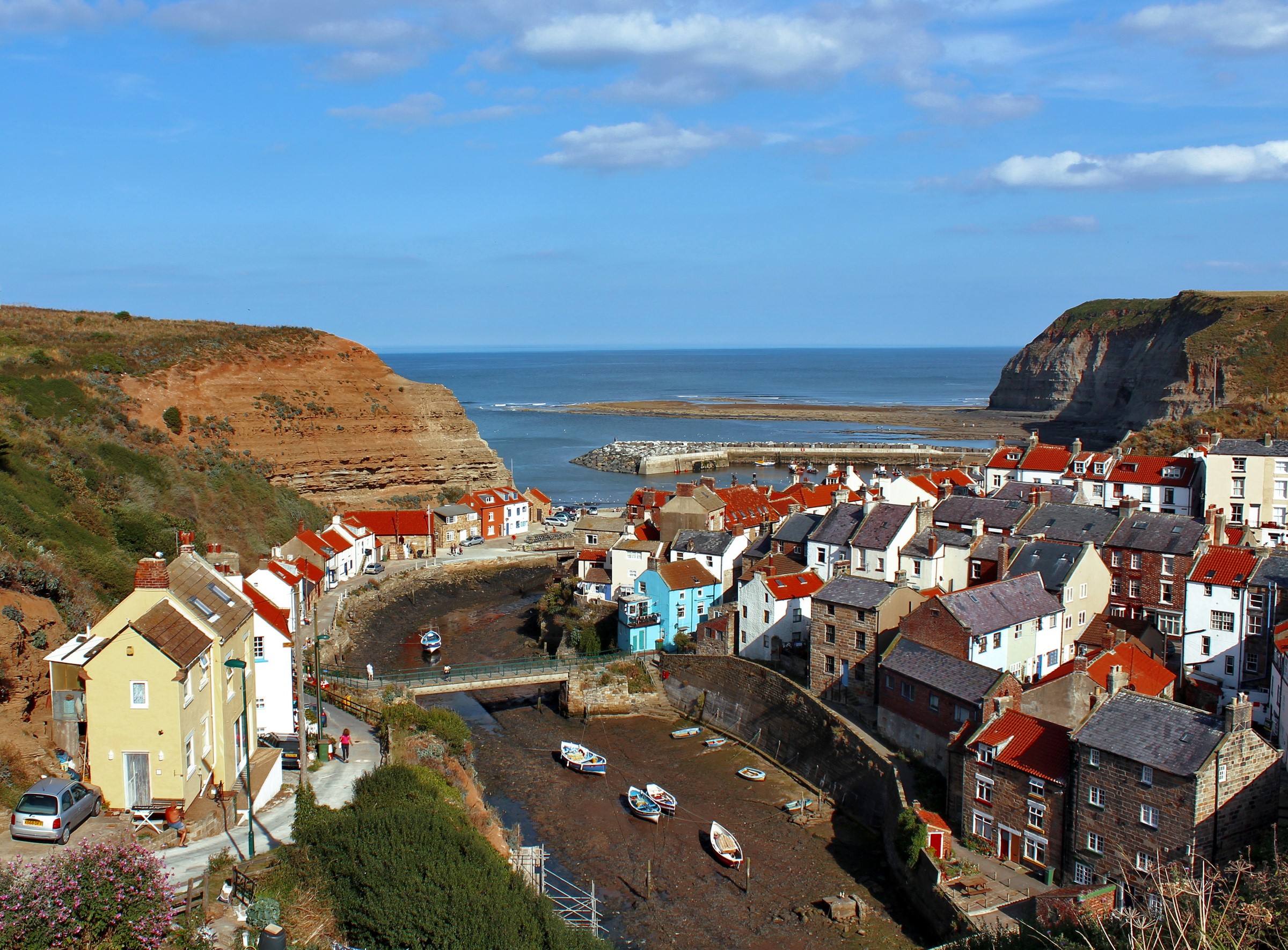Coastal village with harbor and cliffs, United Kingdom HD Wallpaper