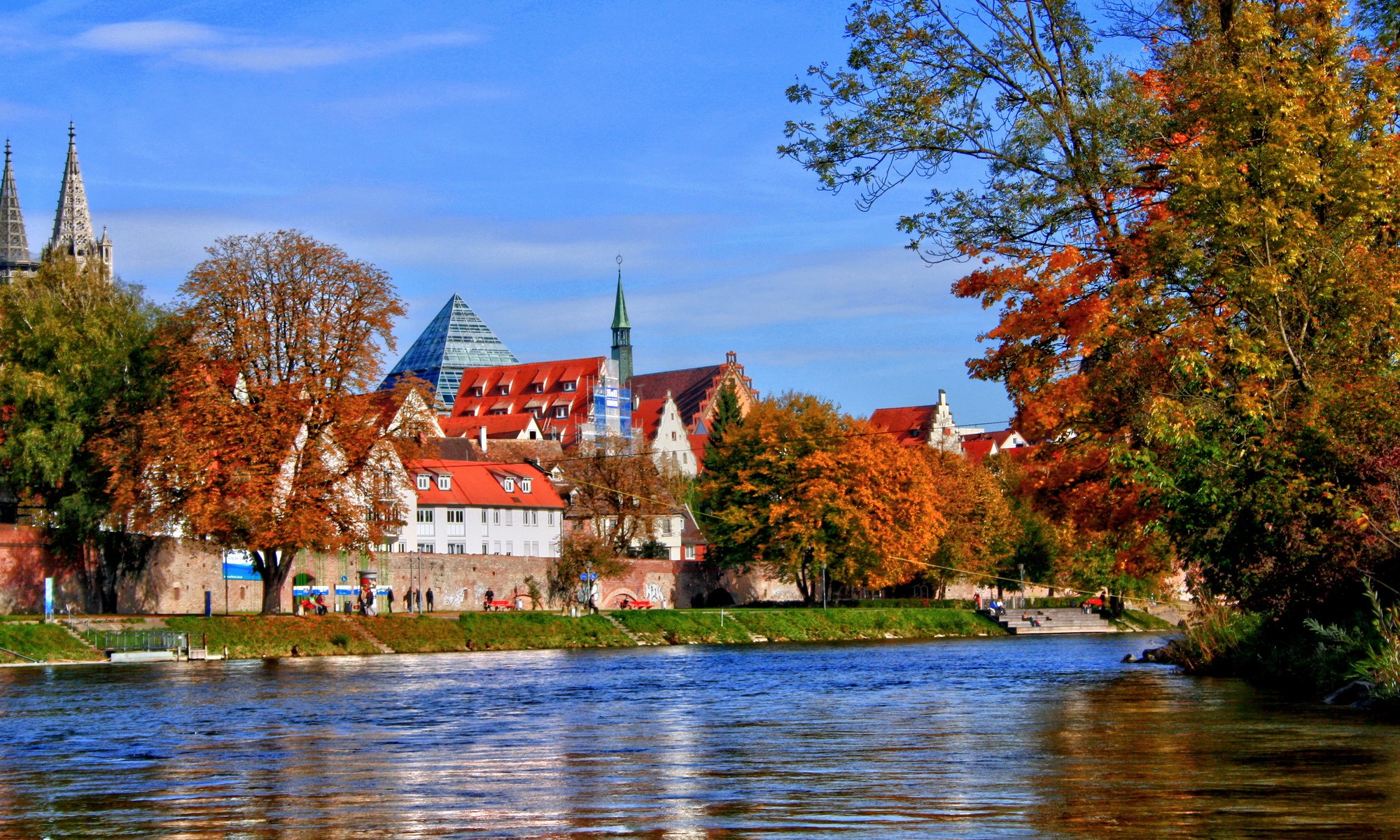 Ulm, Germany cityscape with river and autumn trees HD Wallpaper