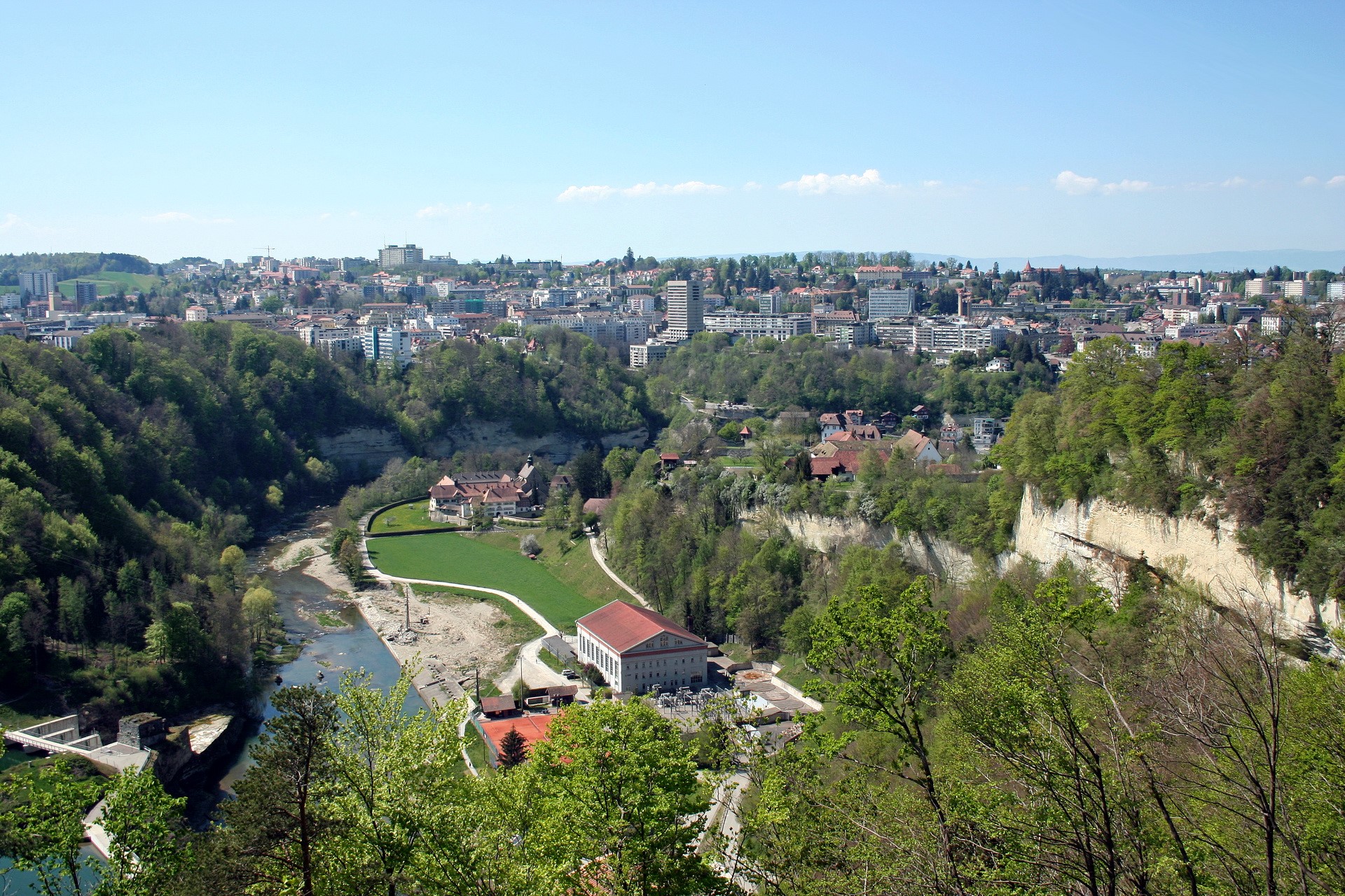 Fribourg, Switzerland cityscape with river and green hills HD Wallpaper