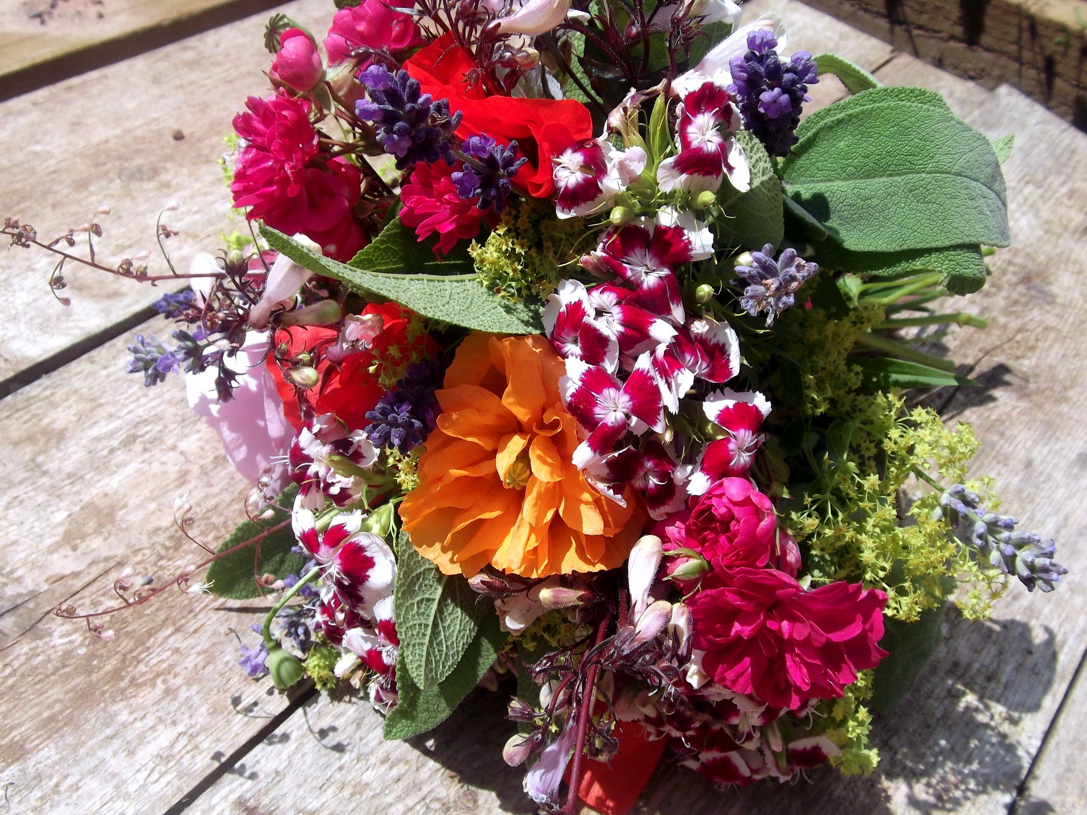 Bouquet of colorful flowers on a wooden table HD Wallpaper