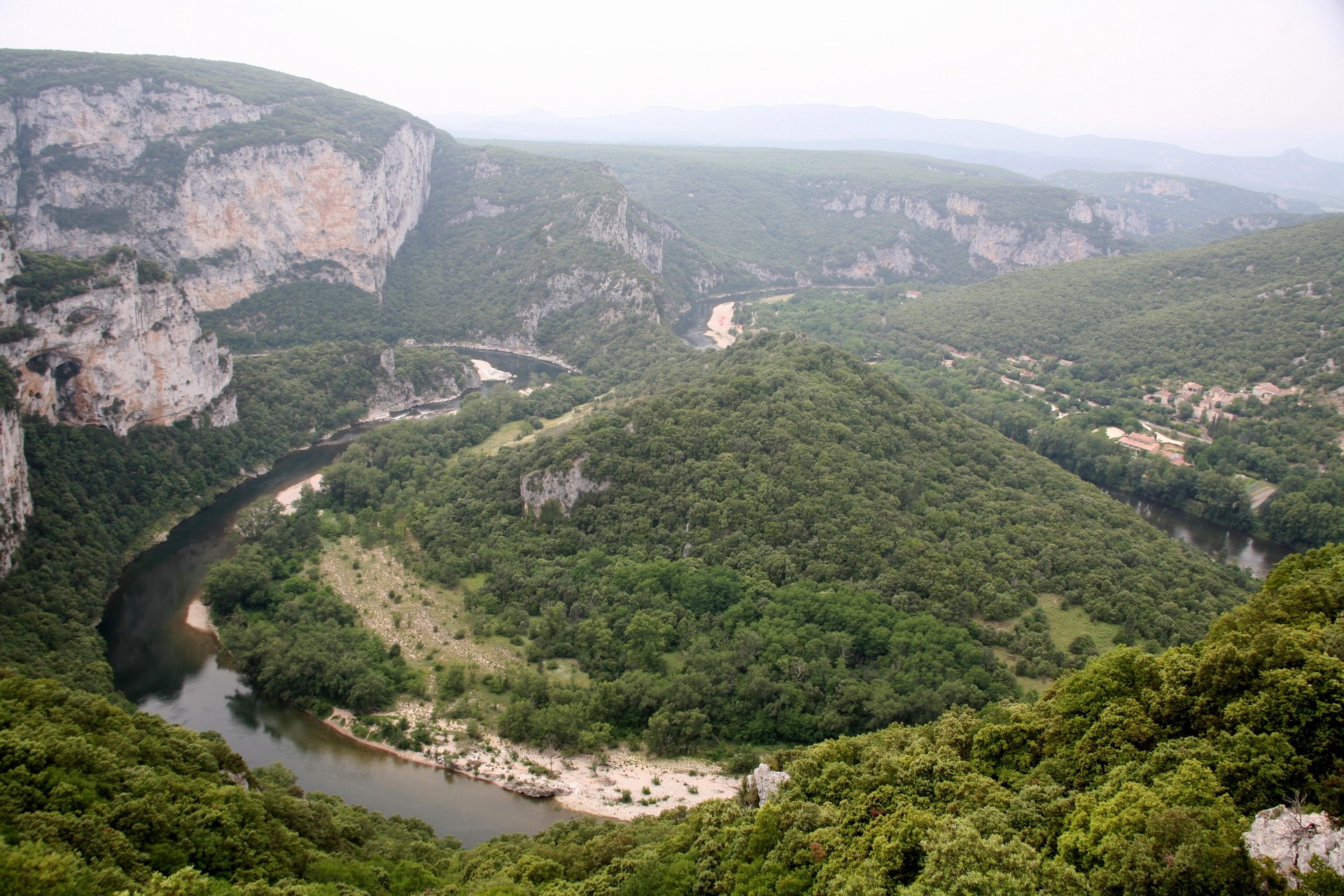 River flowing through a forested canyon in France HD Wallpaper