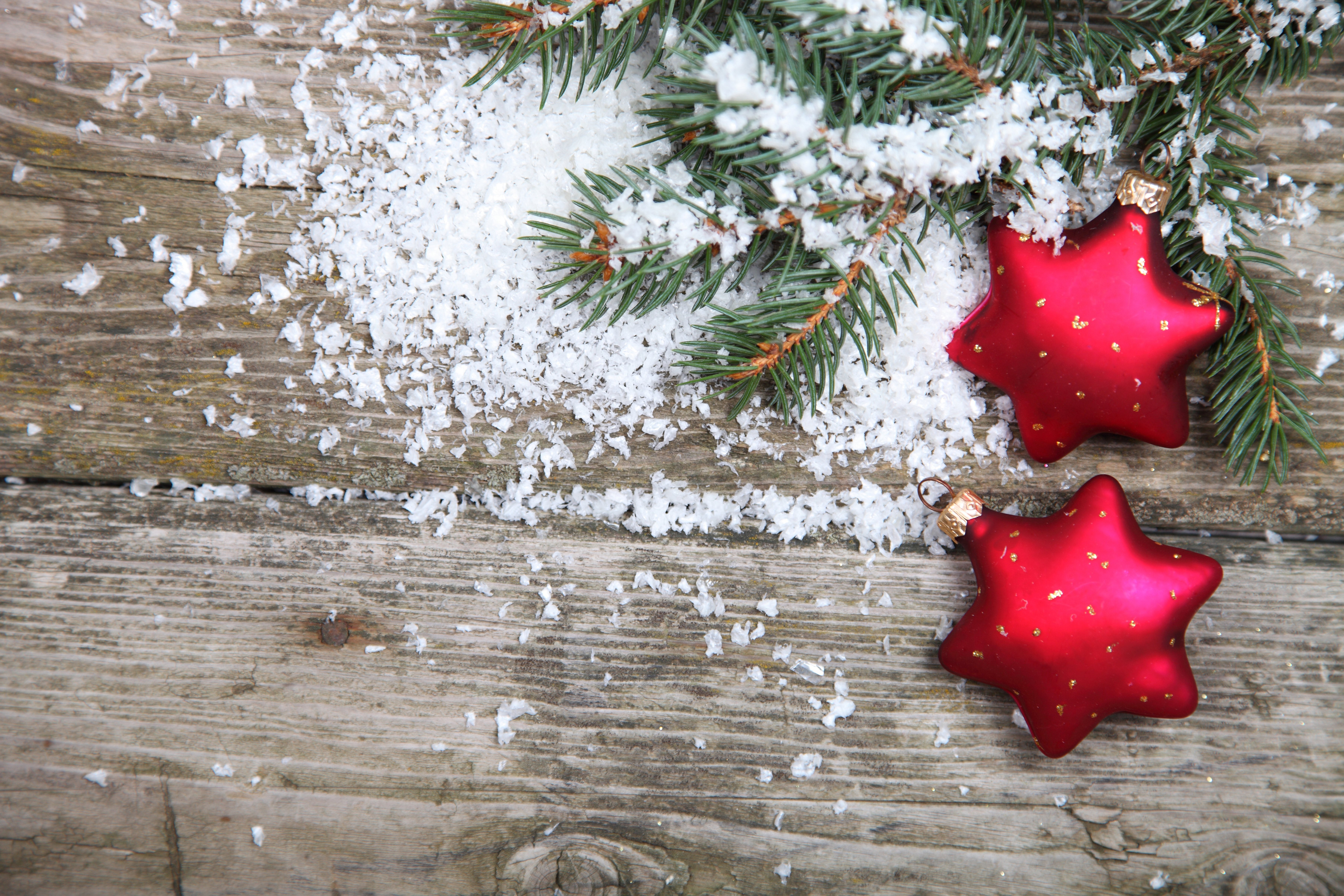 Christmas ornaments and pine branches on wood HD Wallpaper