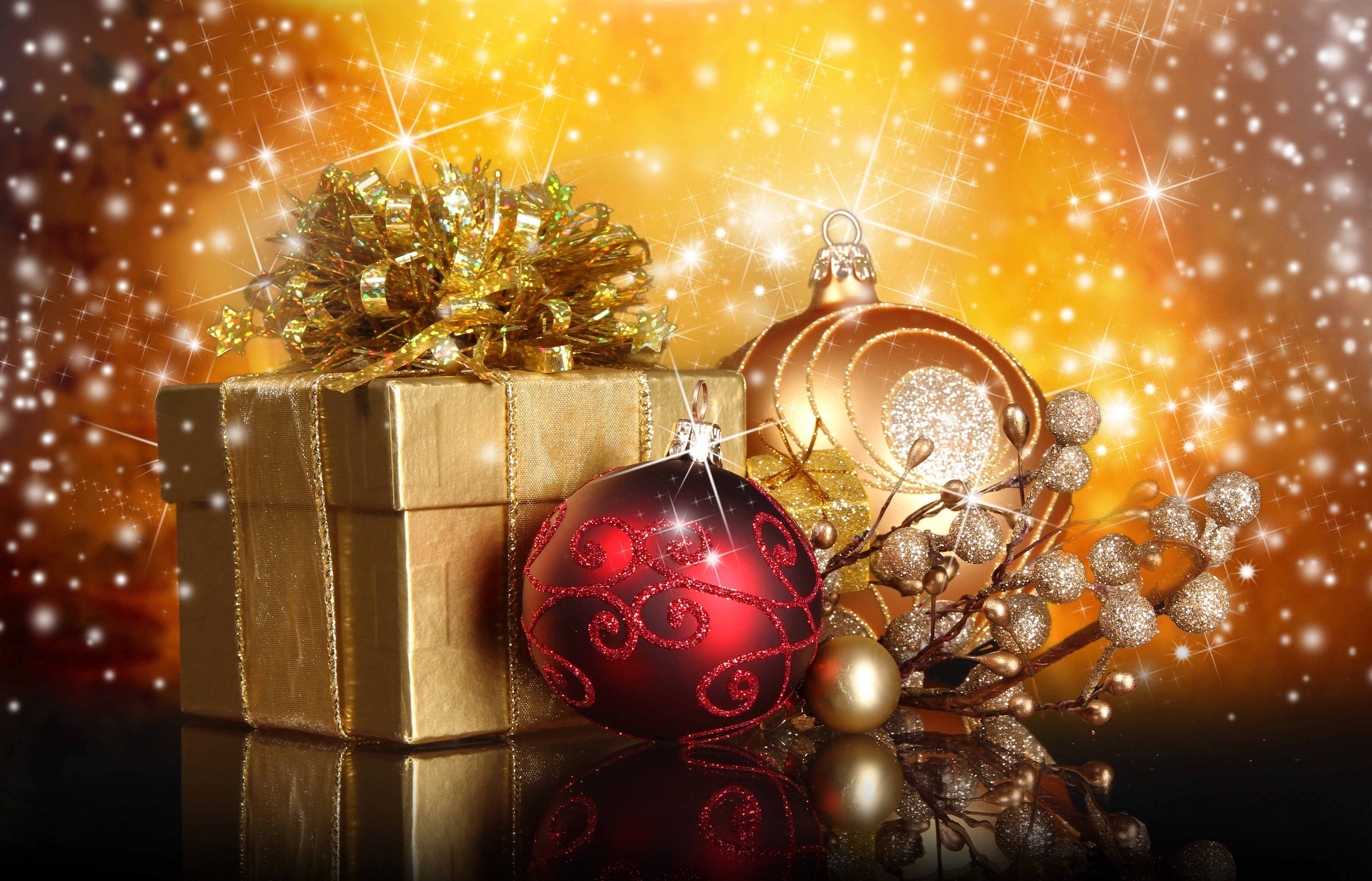 Christmas gift and ornaments with sparkling background HD Wallpaper