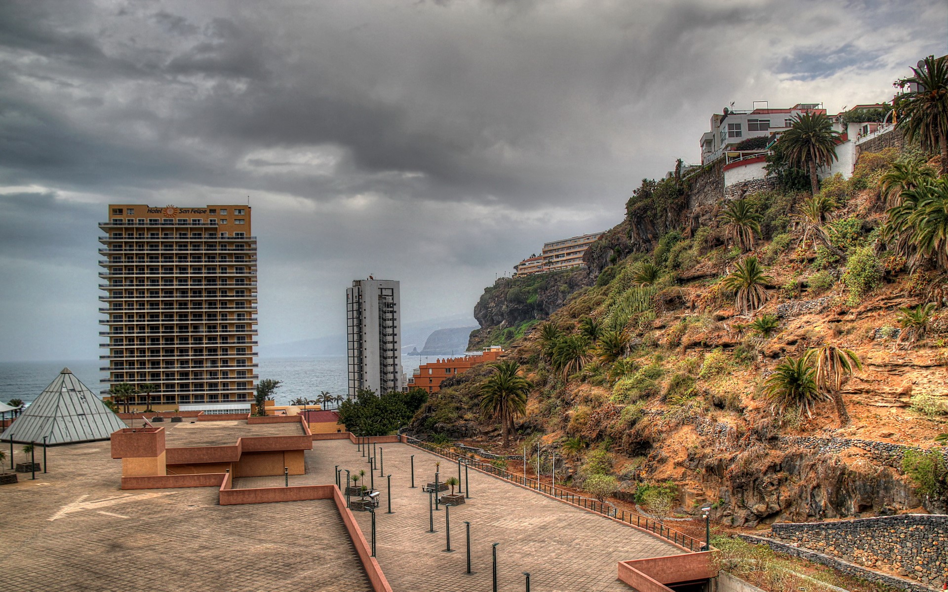 Hotels on a cliffside in Canary Islands, Spain HD Wallpaper