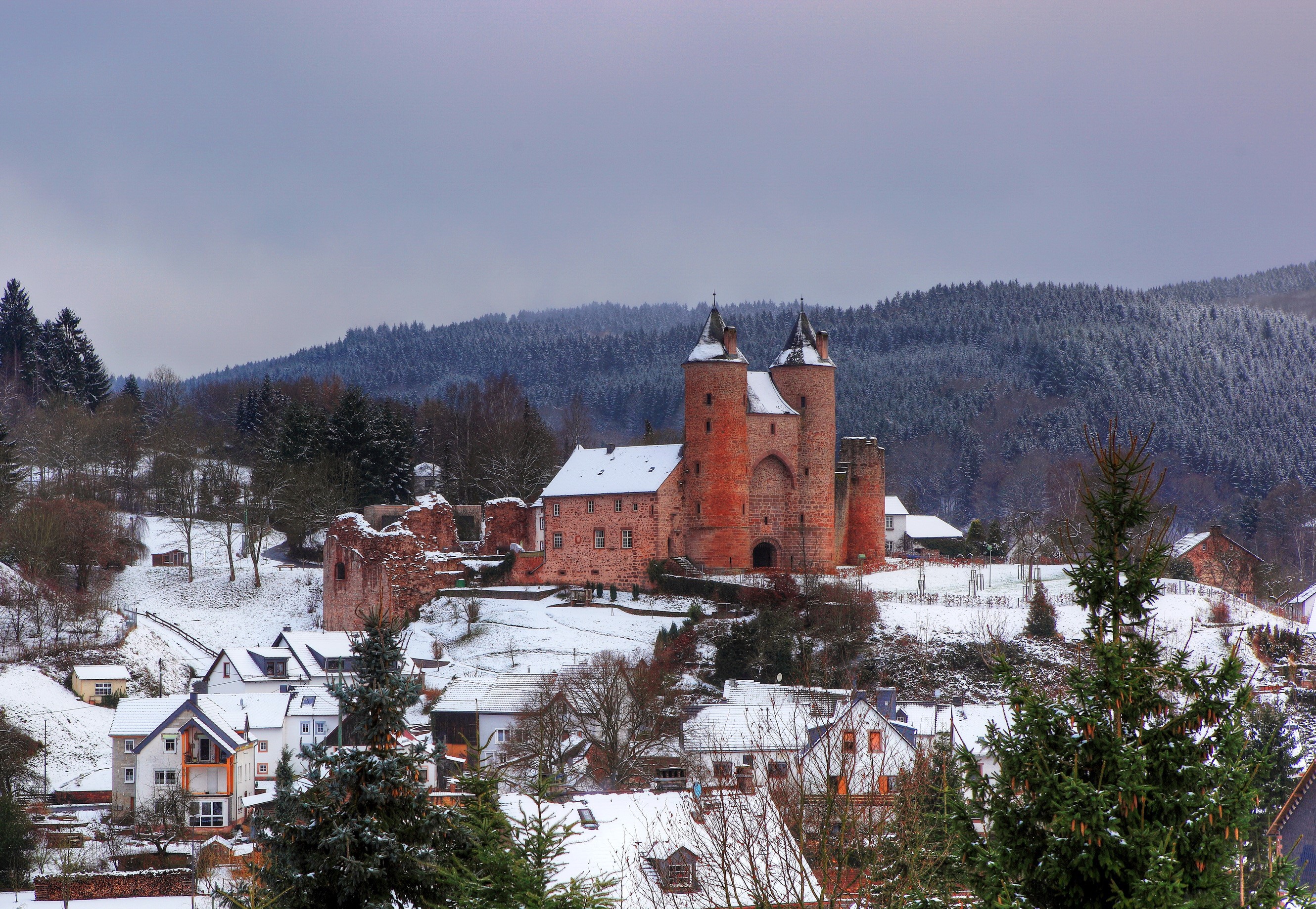 Castle in a snowy German village HD Wallpaper