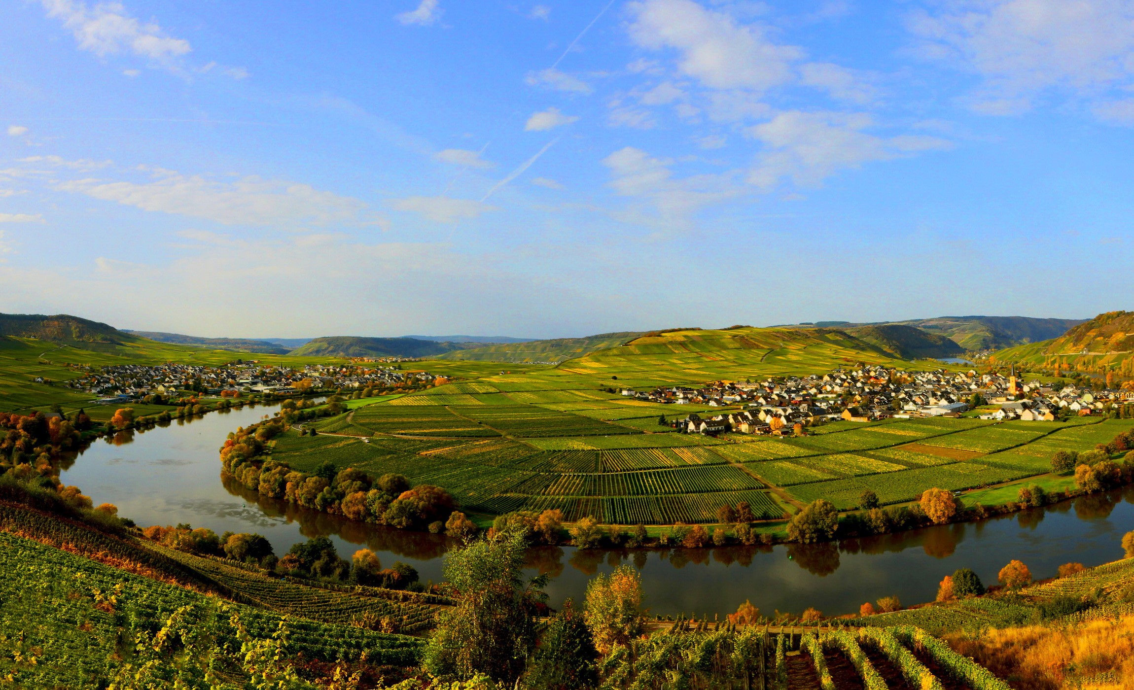 River valley with vineyards and village in Germany HD Wallpaper