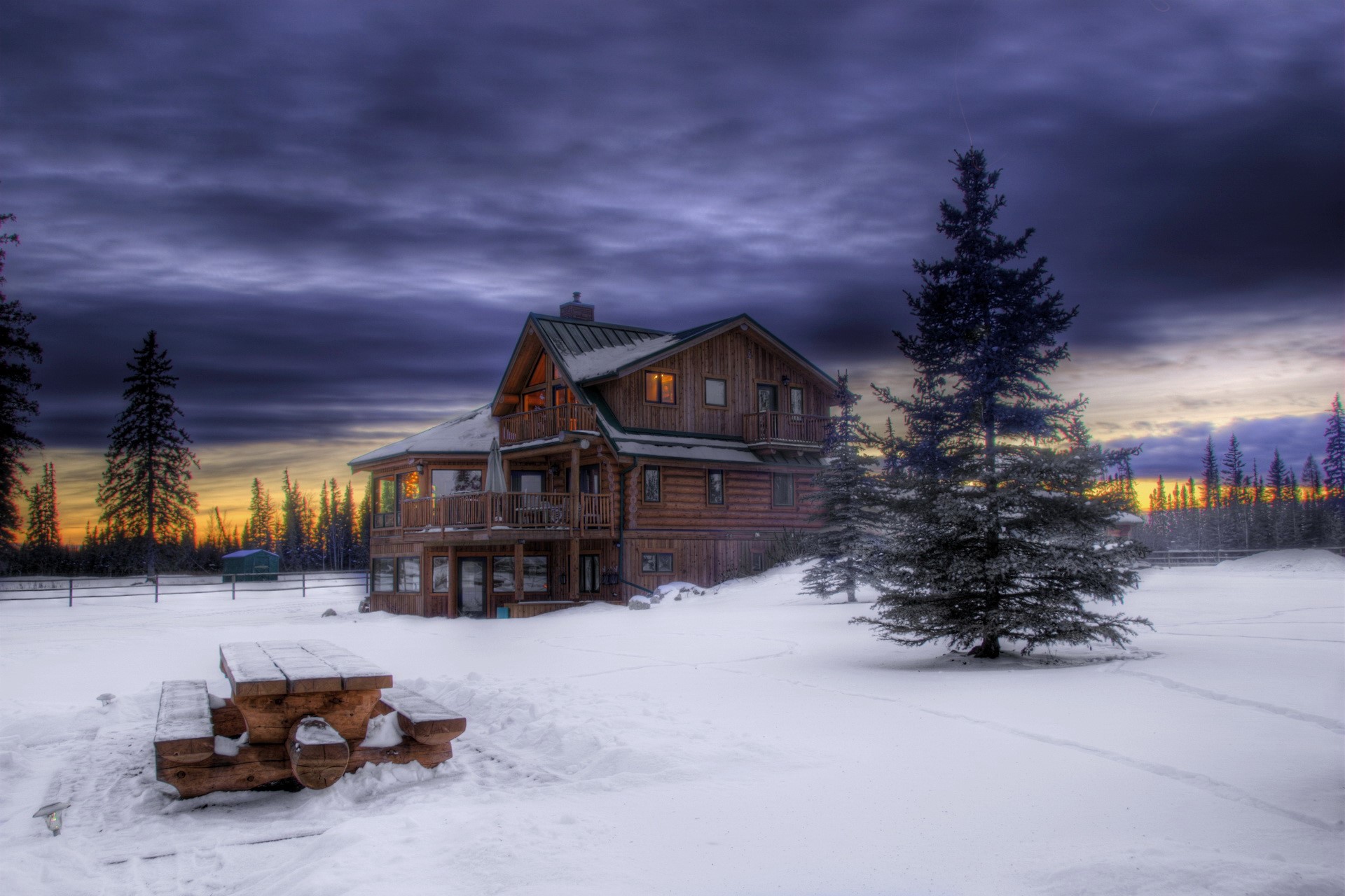 Log cabin in the snow at sunset HD Wallpaper