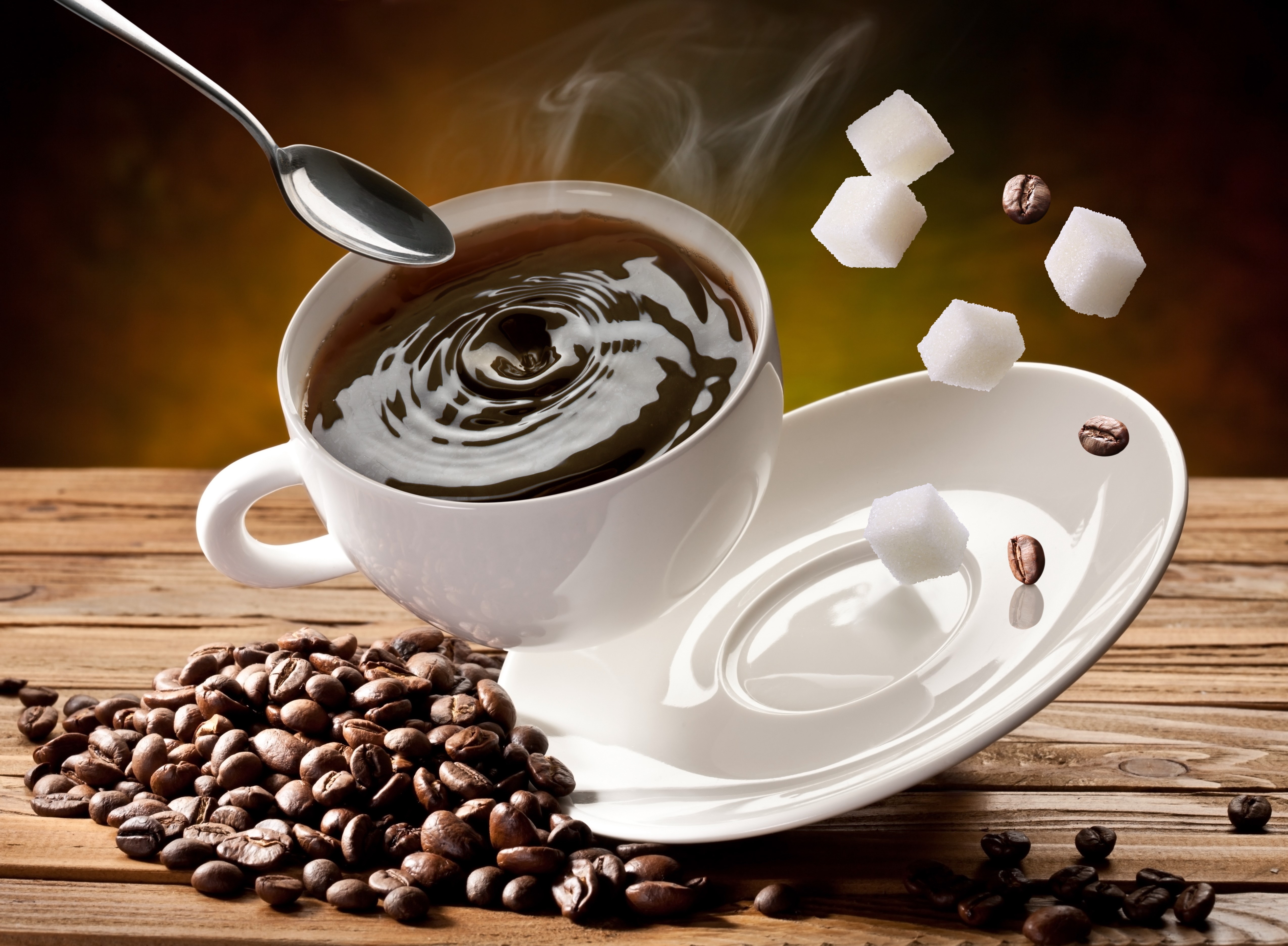 Coffee cup with sugar cubes and coffee beans HD Wallpaper