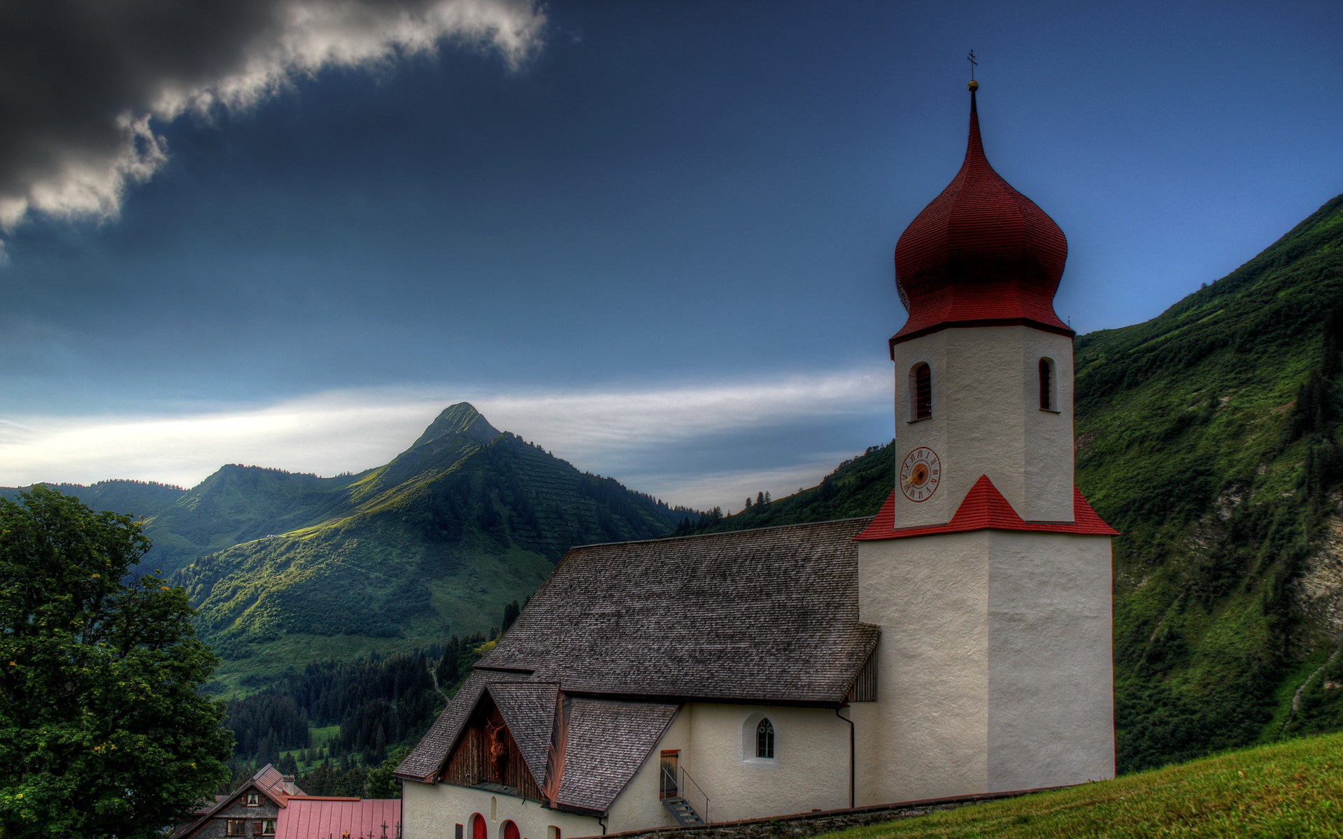 Church with red dome in Austrian mountains HD Wallpaper