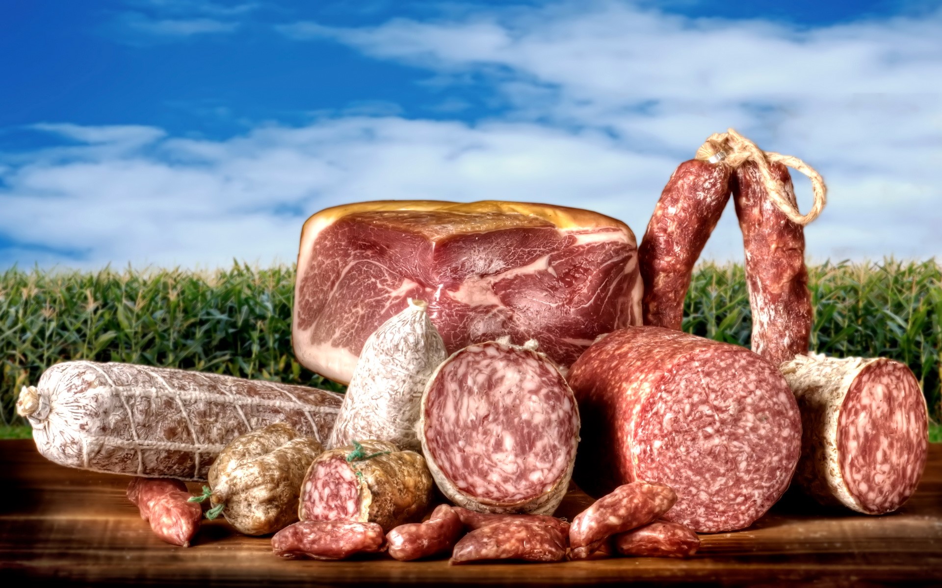 Assortment of cured meats and sausages HD Wallpaper