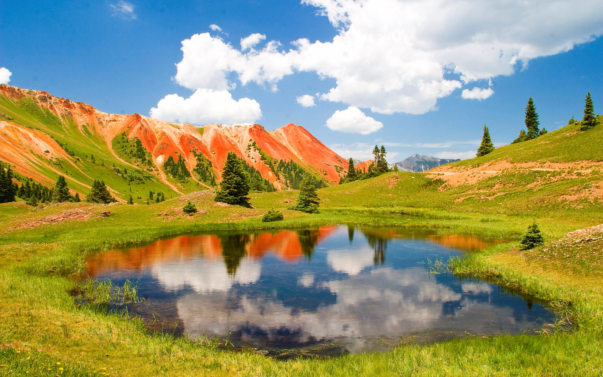 Red Mountains Reflecting in a Pond HD Wallpaper