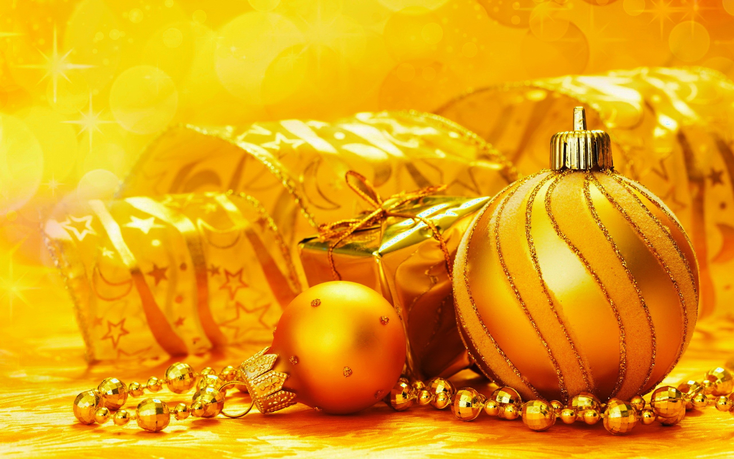 Golden Christmas Ornaments and Gifts HD Wallpaper