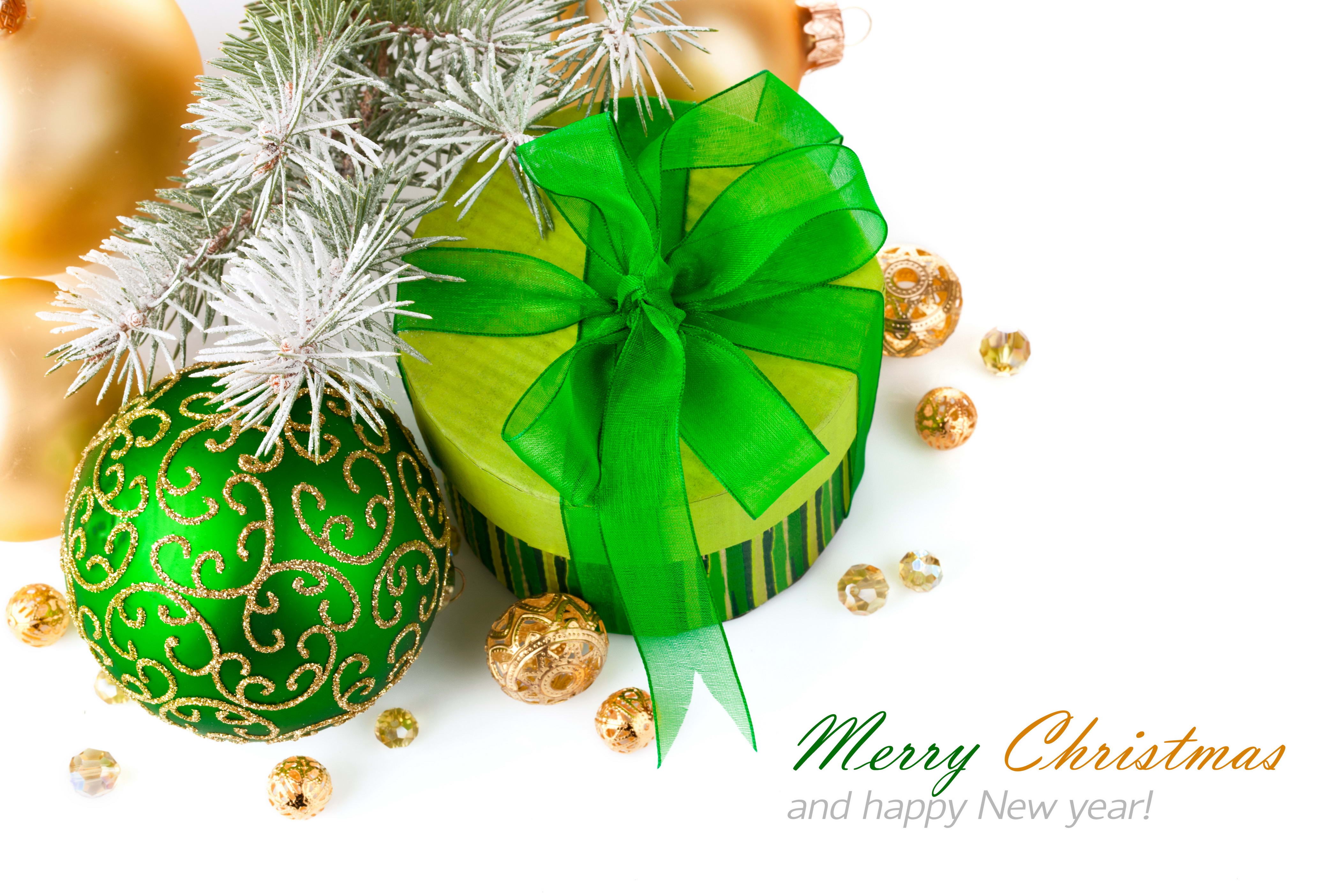 Christmas gift with ornaments and pine branches HD Wallpaper