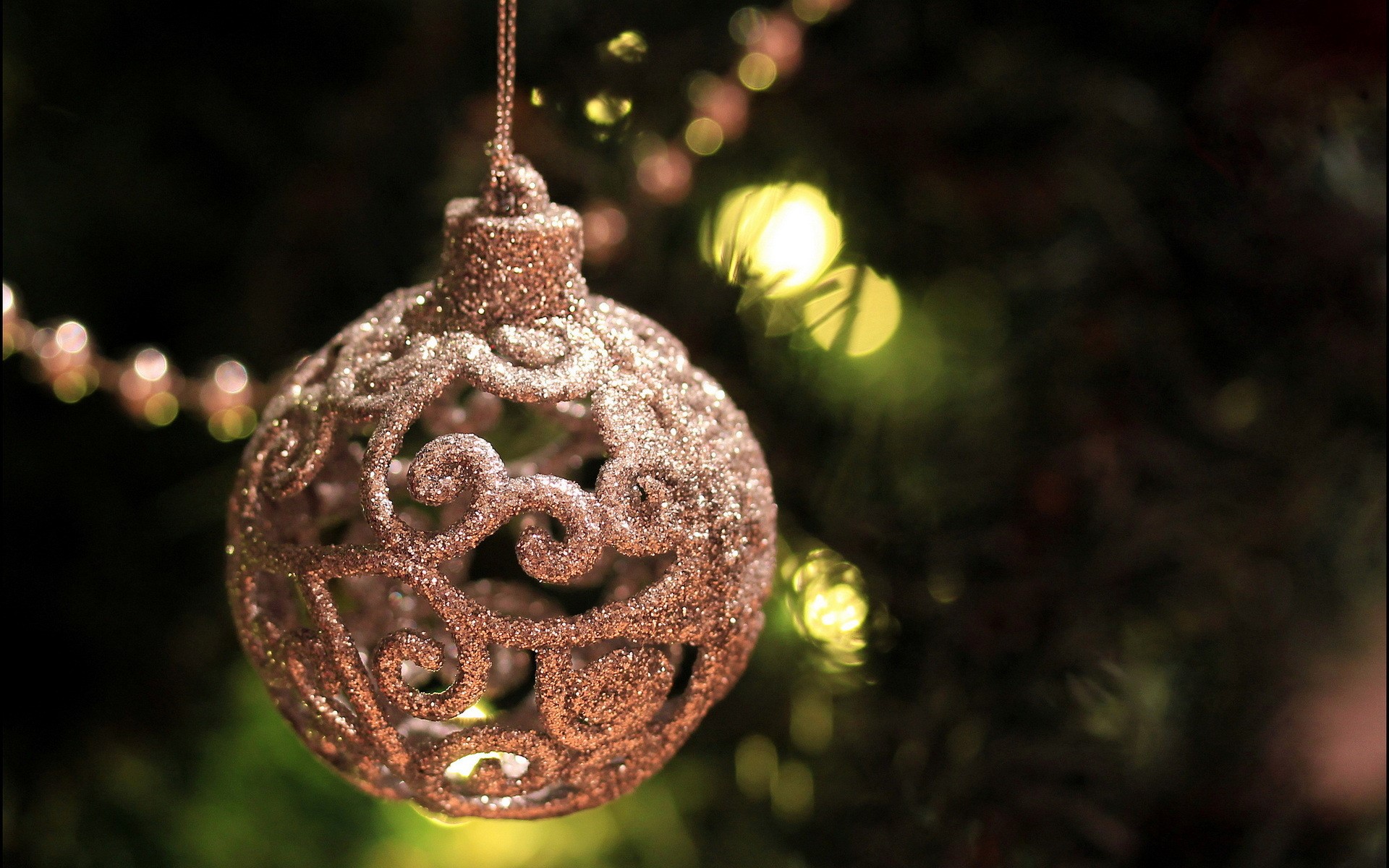 Glittery Christmas Ornament on a Tree HD Wallpaper