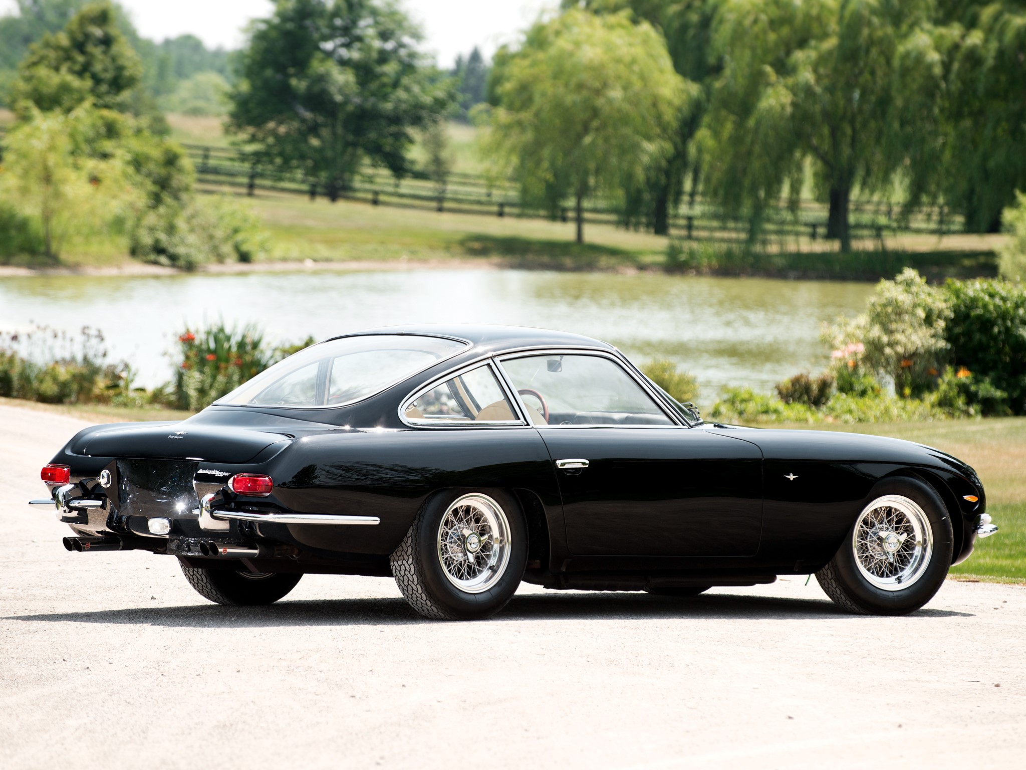 Black Lamborghini 350 GT parked by a lake HD Wallpaper