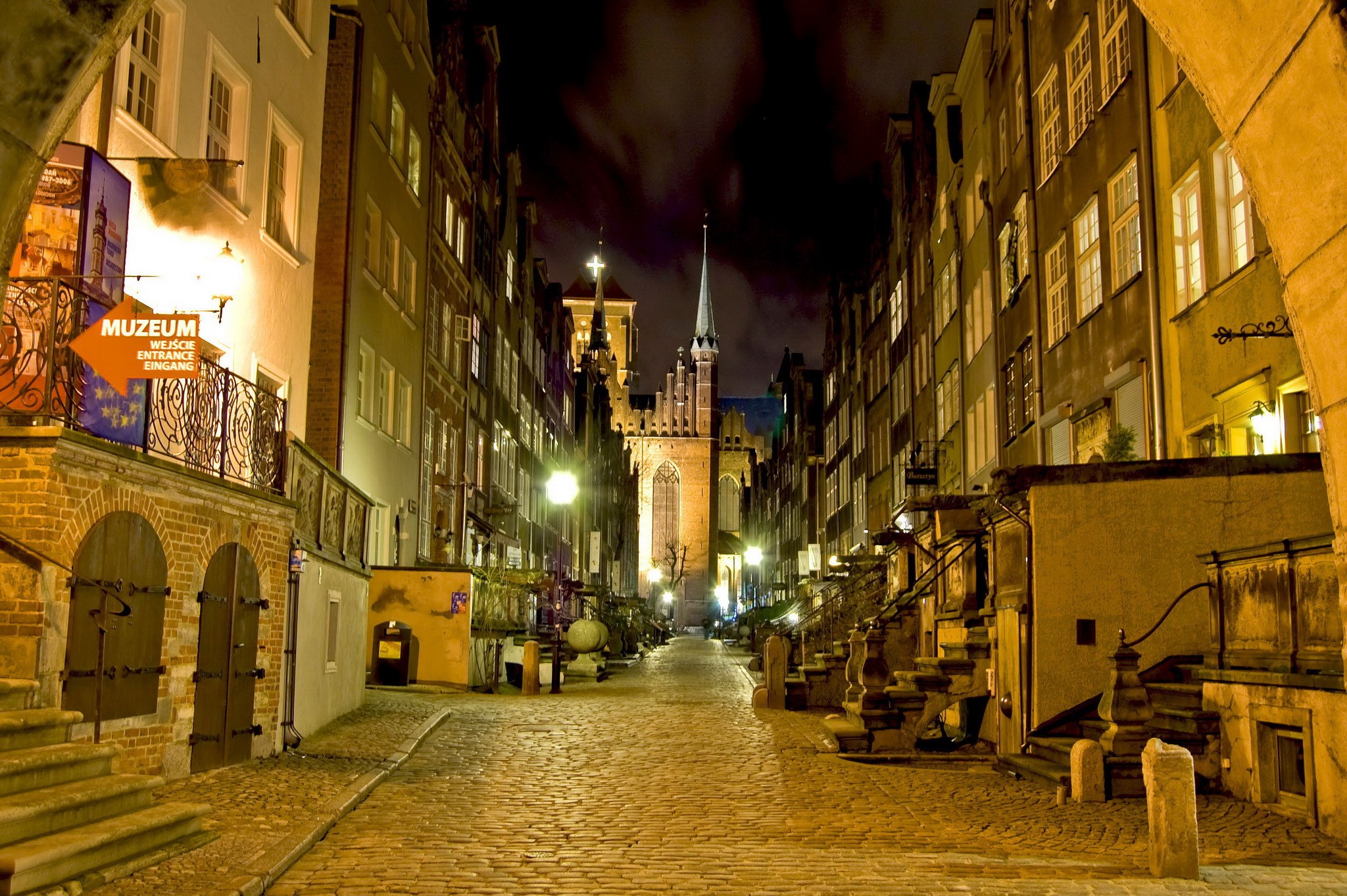 Night street in Poland with old houses and church HD Wallpaper