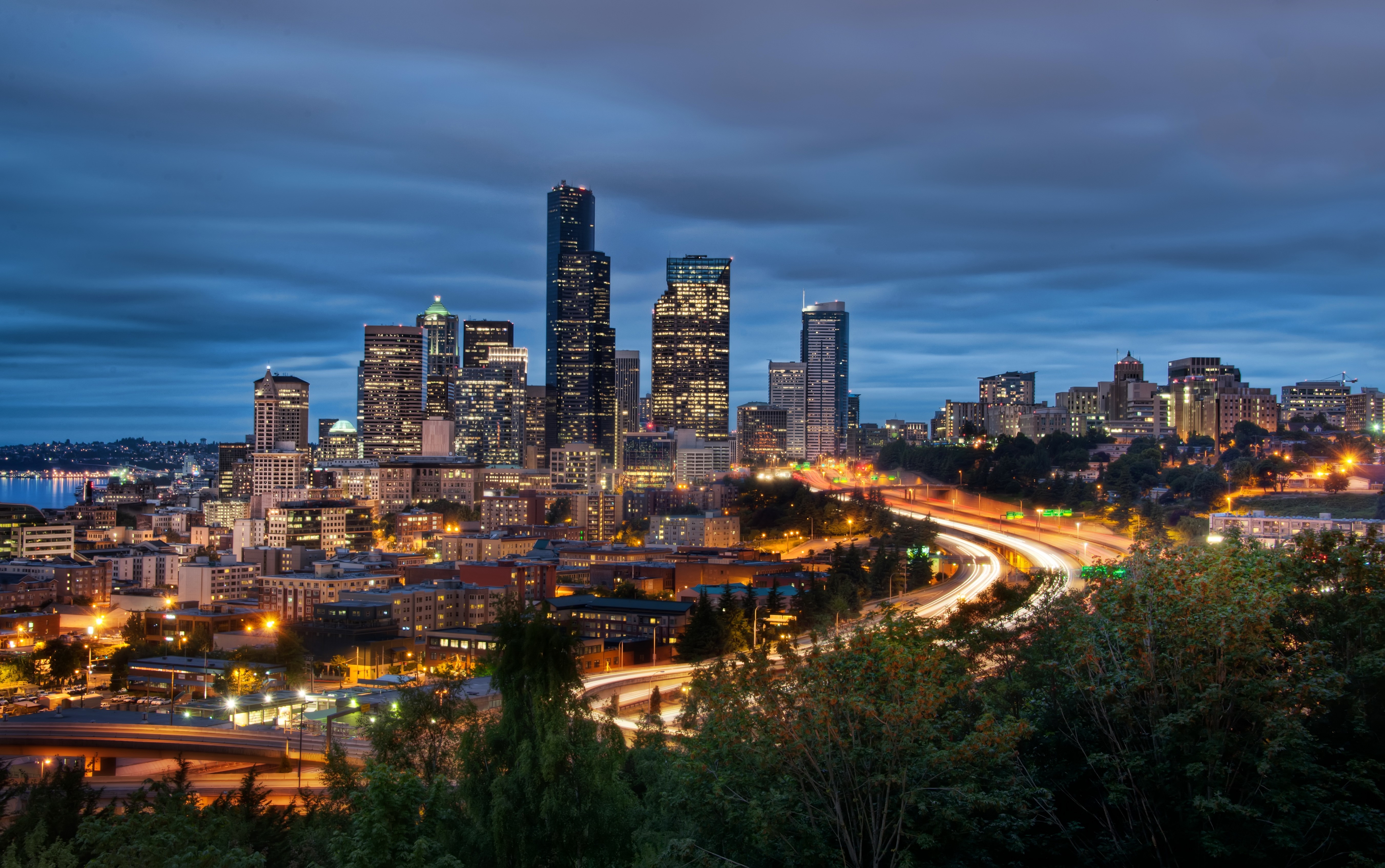 Seattle Skyline at Night with City Lights and Highway HD Wallpaper