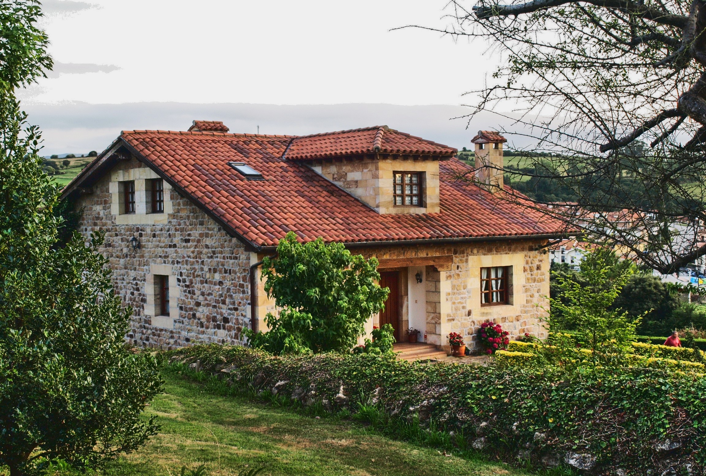 Stone house with red tile roof in Spain HD Wallpaper