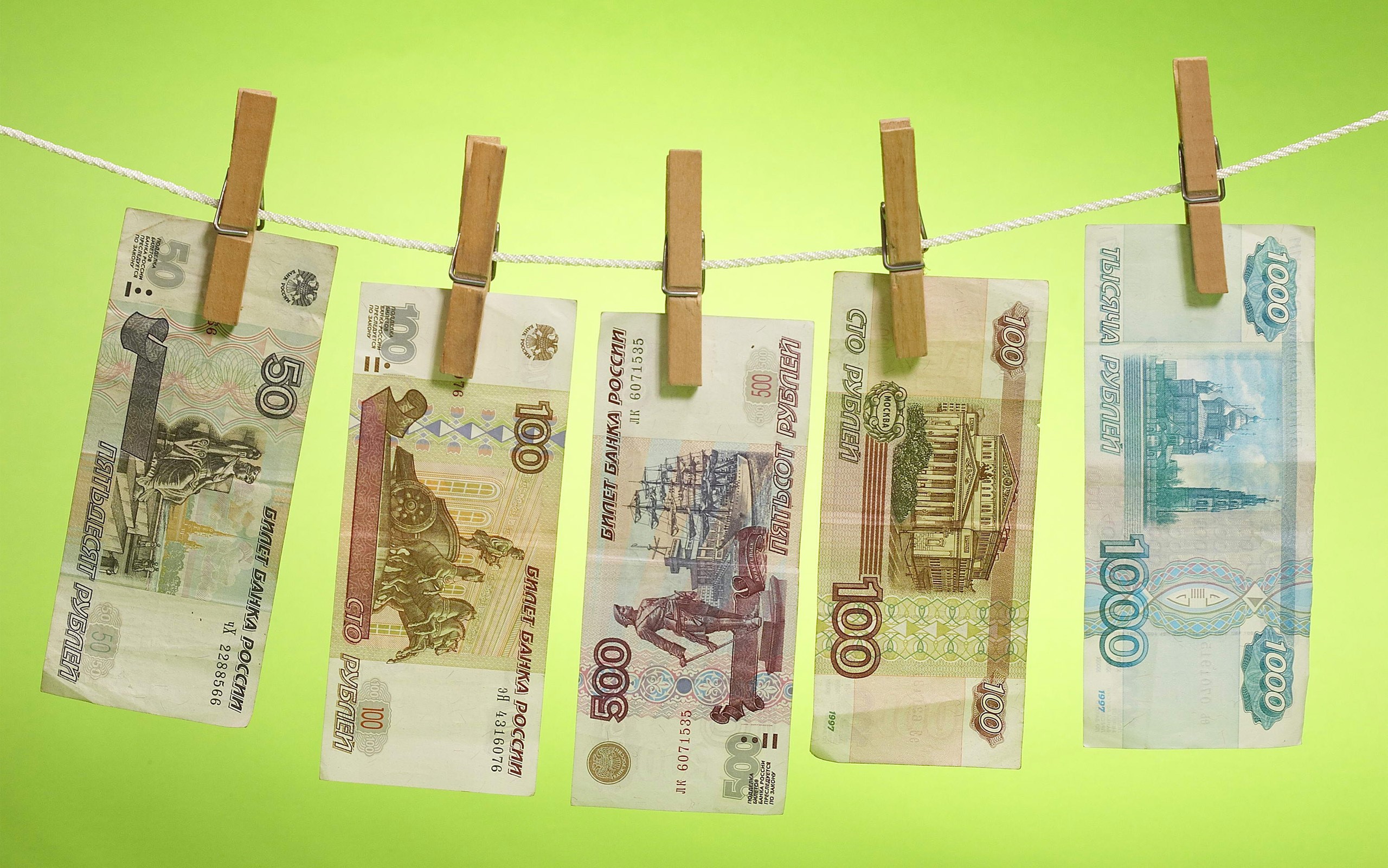 Russian Rubles hanging on a clothesline HD Wallpaper