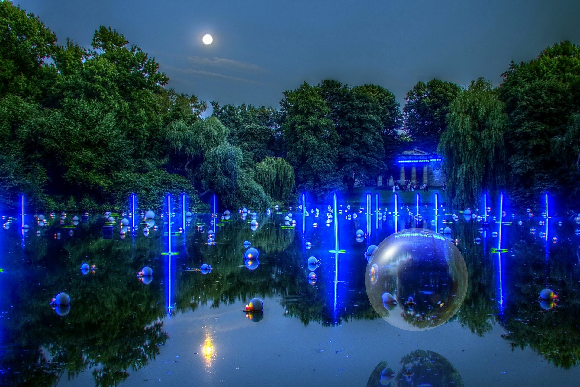 Lake with blue lights and moon at night HD Wallpaper