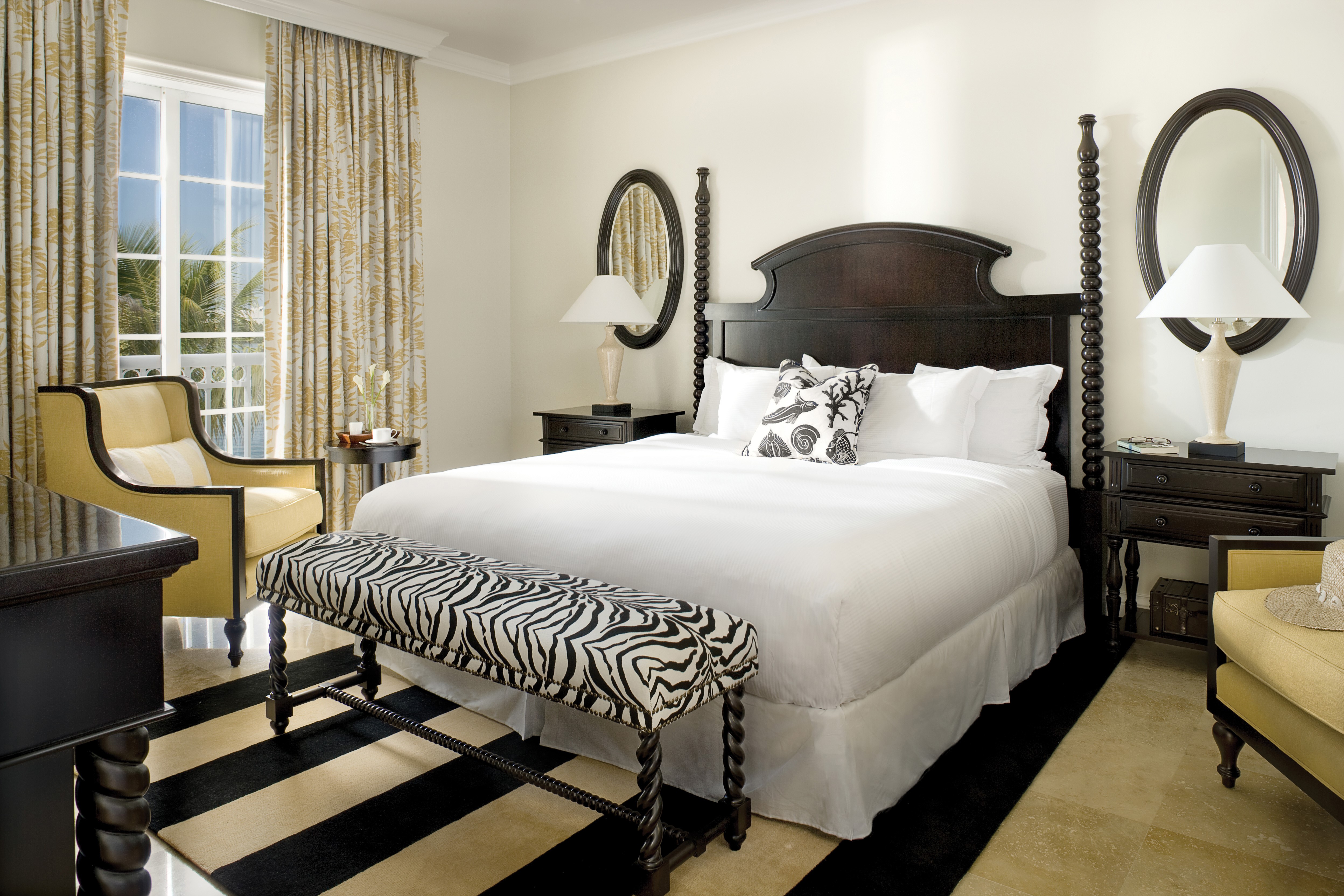 Bedroom with four-poster bed and zebra bench HD Wallpaper