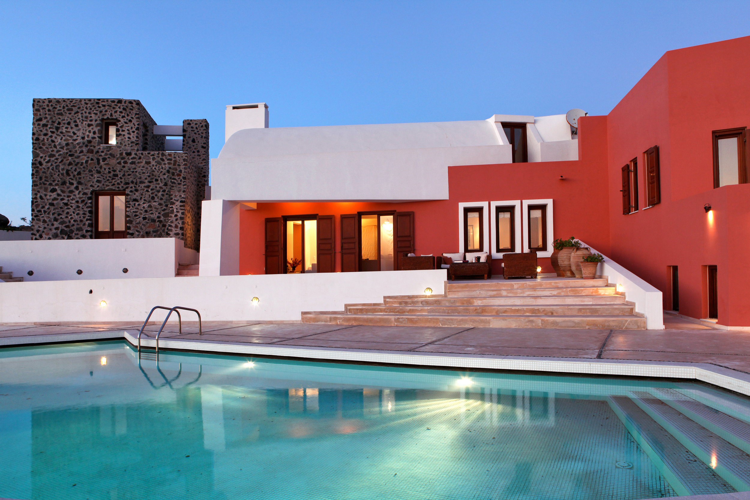 Modern villa with pool and red facade HD Wallpaper
