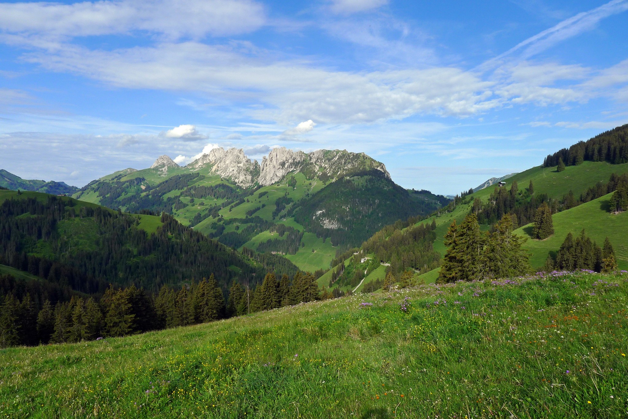 Gastlosen Mountains in Switzerland with Green Valleys and Blue Sky HD Wallpaper