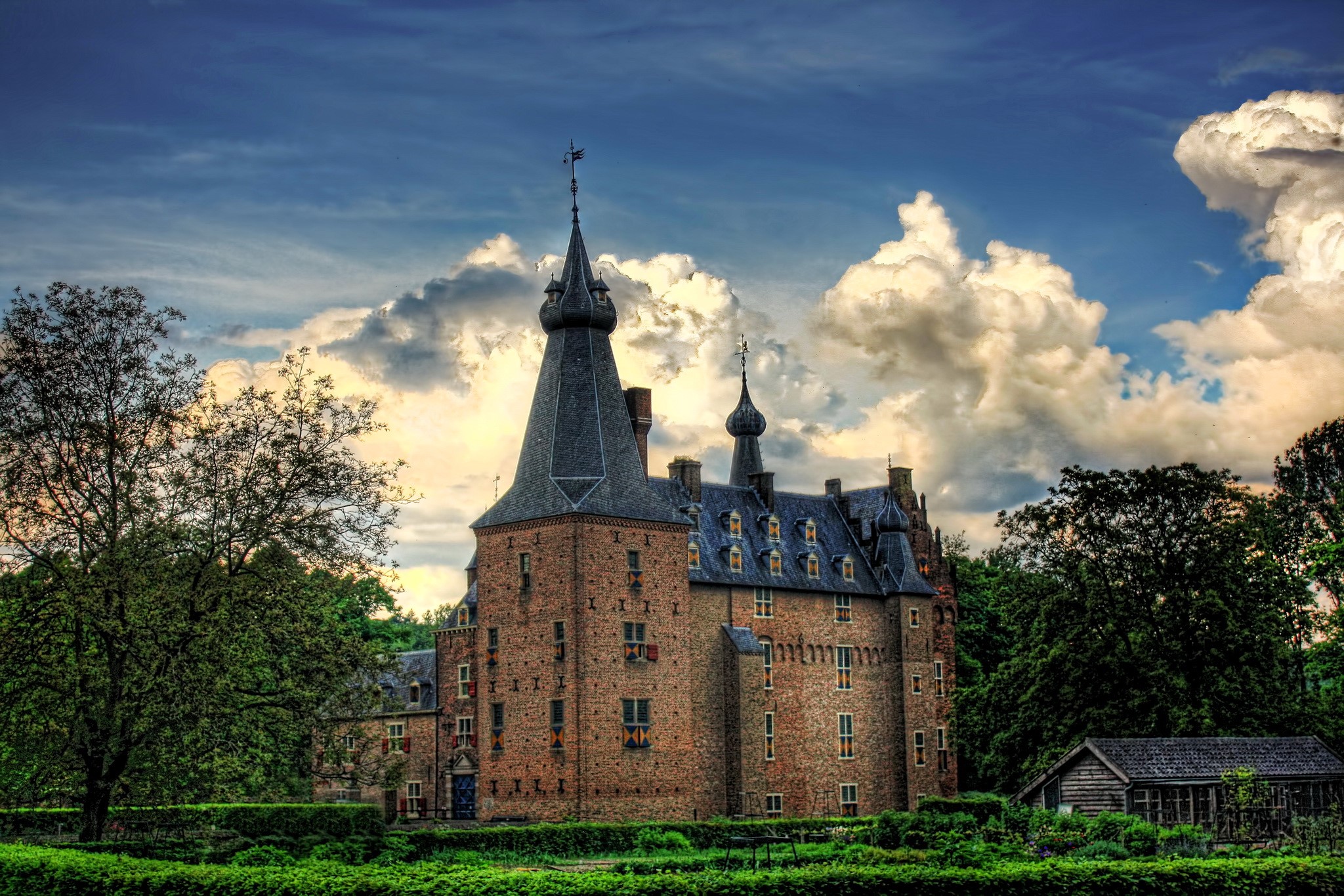 Doorwerth Castle in the Netherlands under a cloudy sky HD Wallpaper