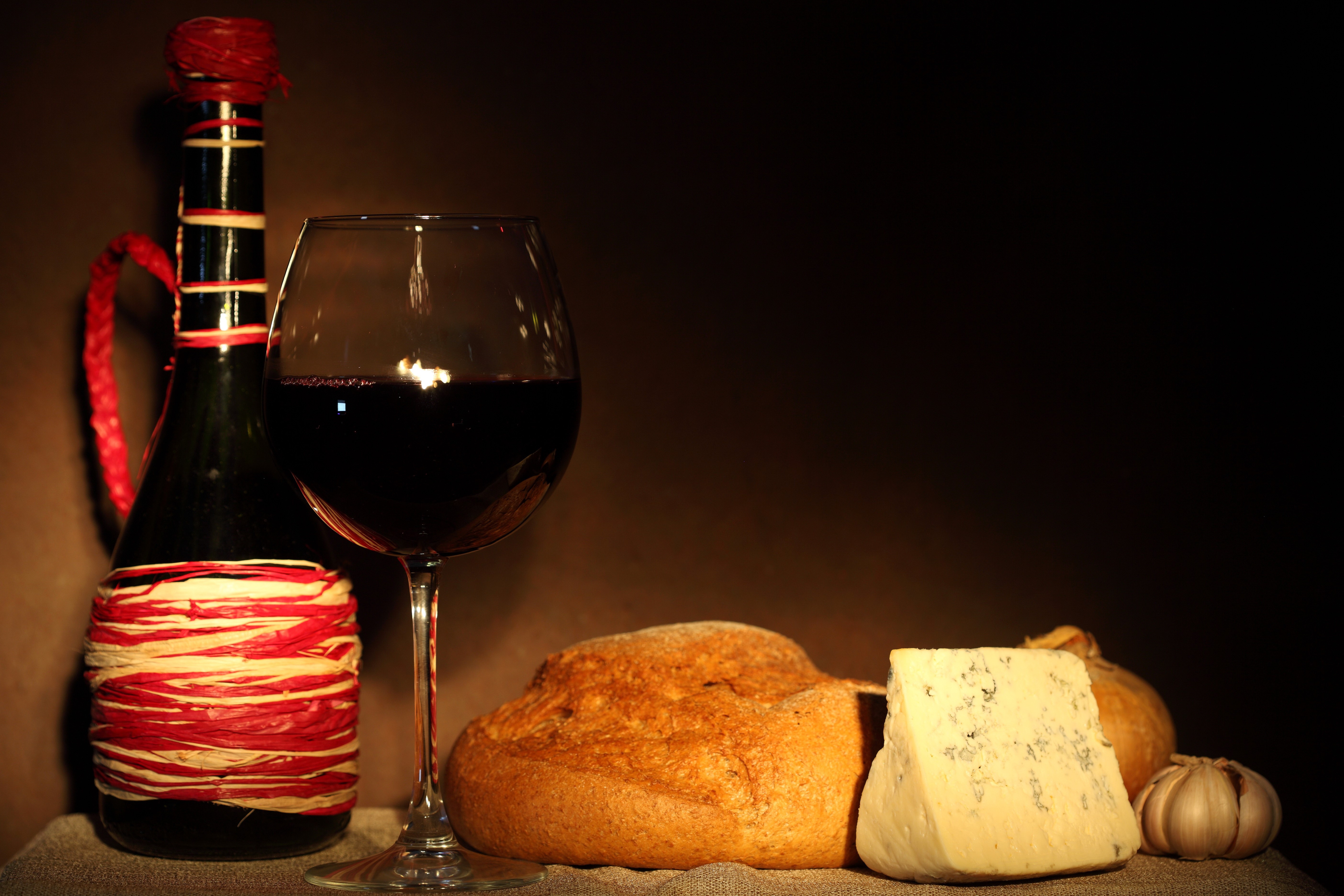 Still-life with wine, bread, cheese, and garlic HD Wallpaper