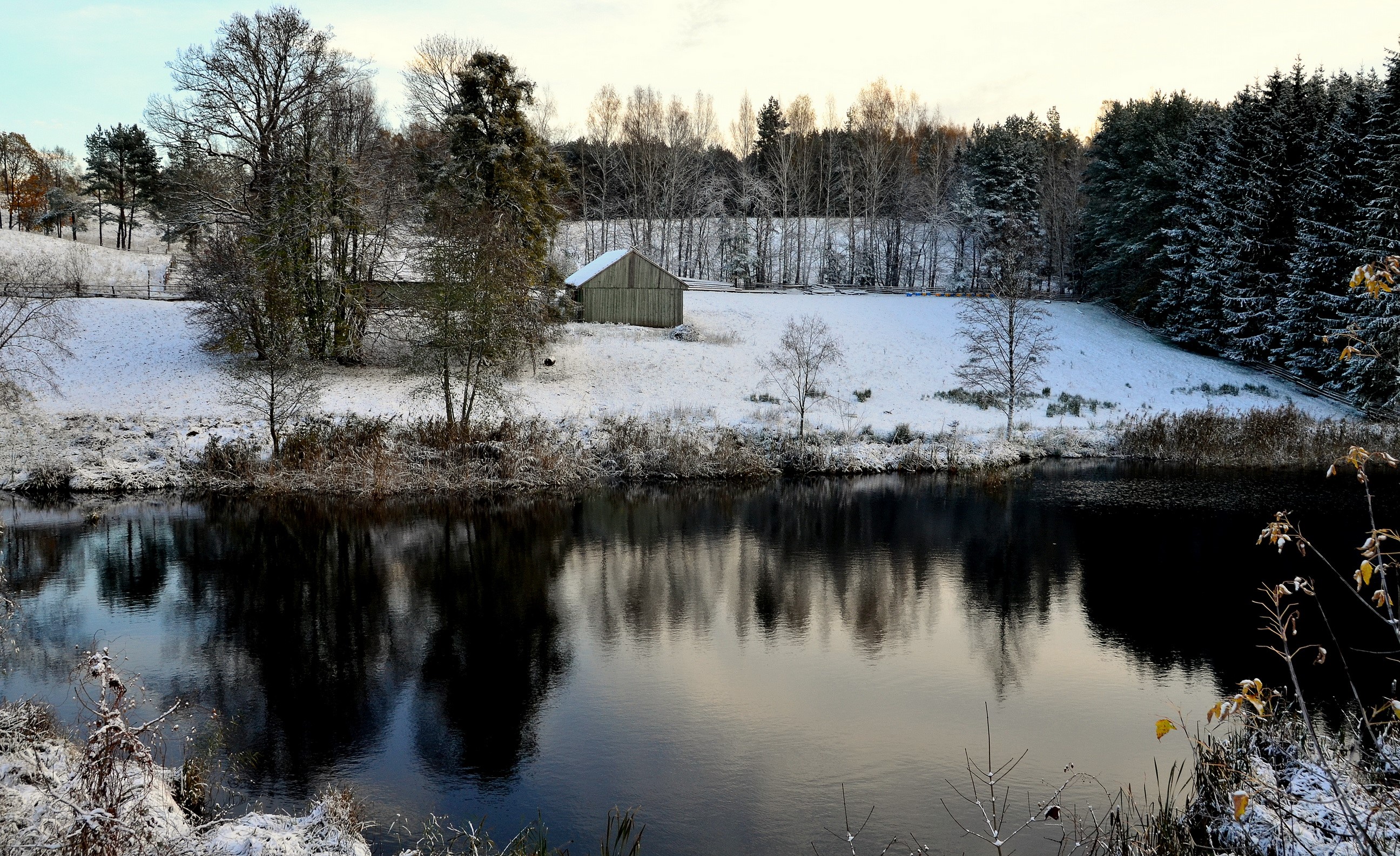 Winter landscape with a barn and a lake in Lithuania HD Wallpaper