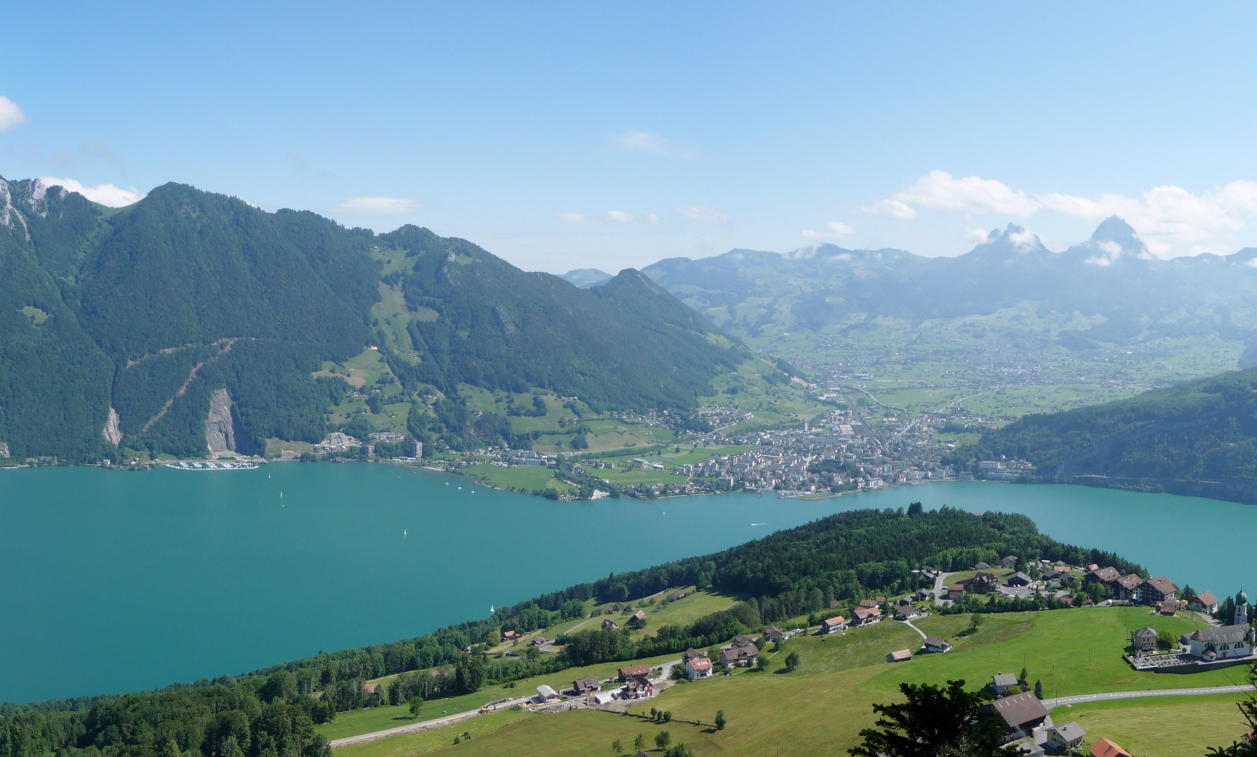 View of a Swiss lake and mountains from above HD Wallpaper