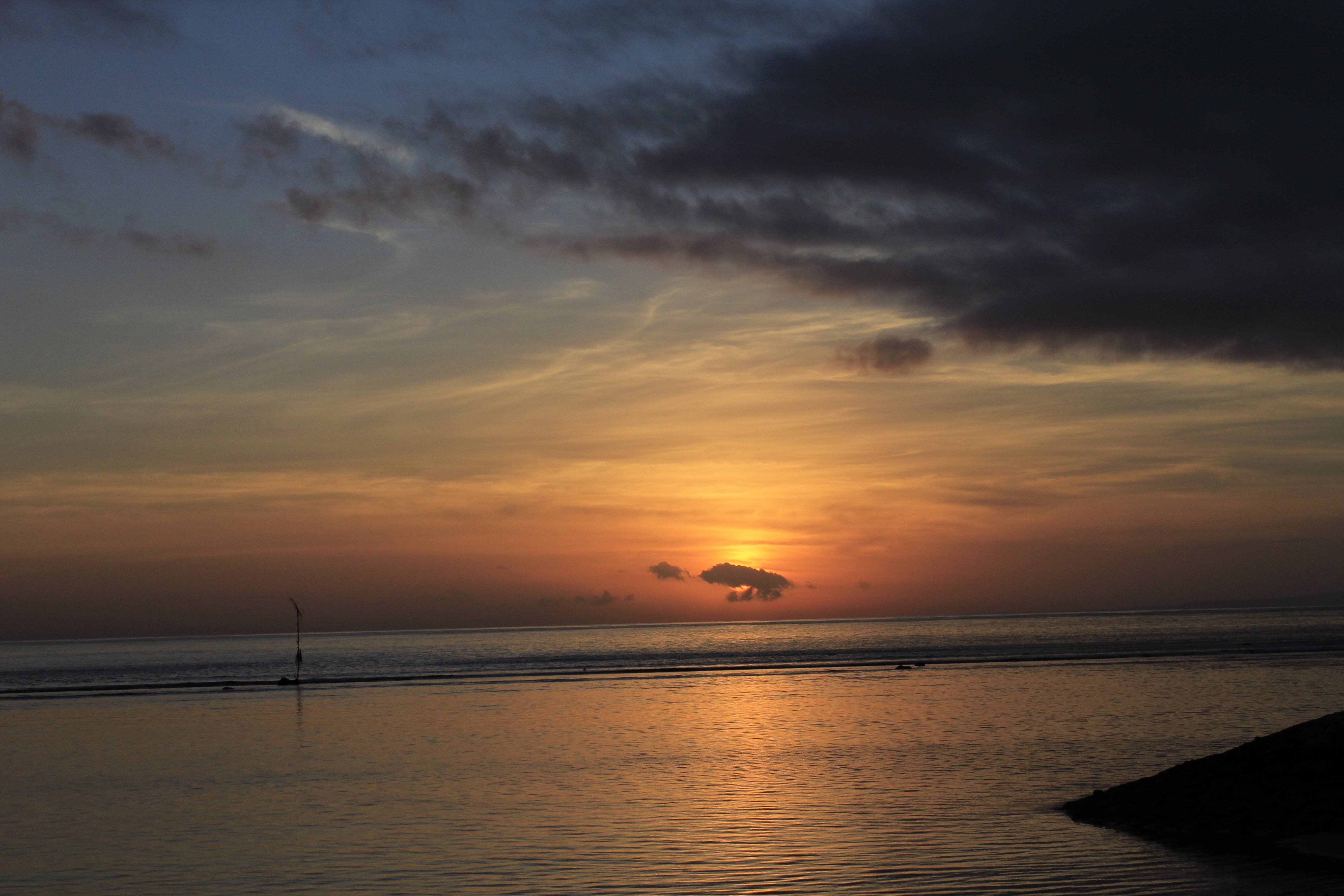 Sunset over the sea with clouds and a pole HD Wallpaper